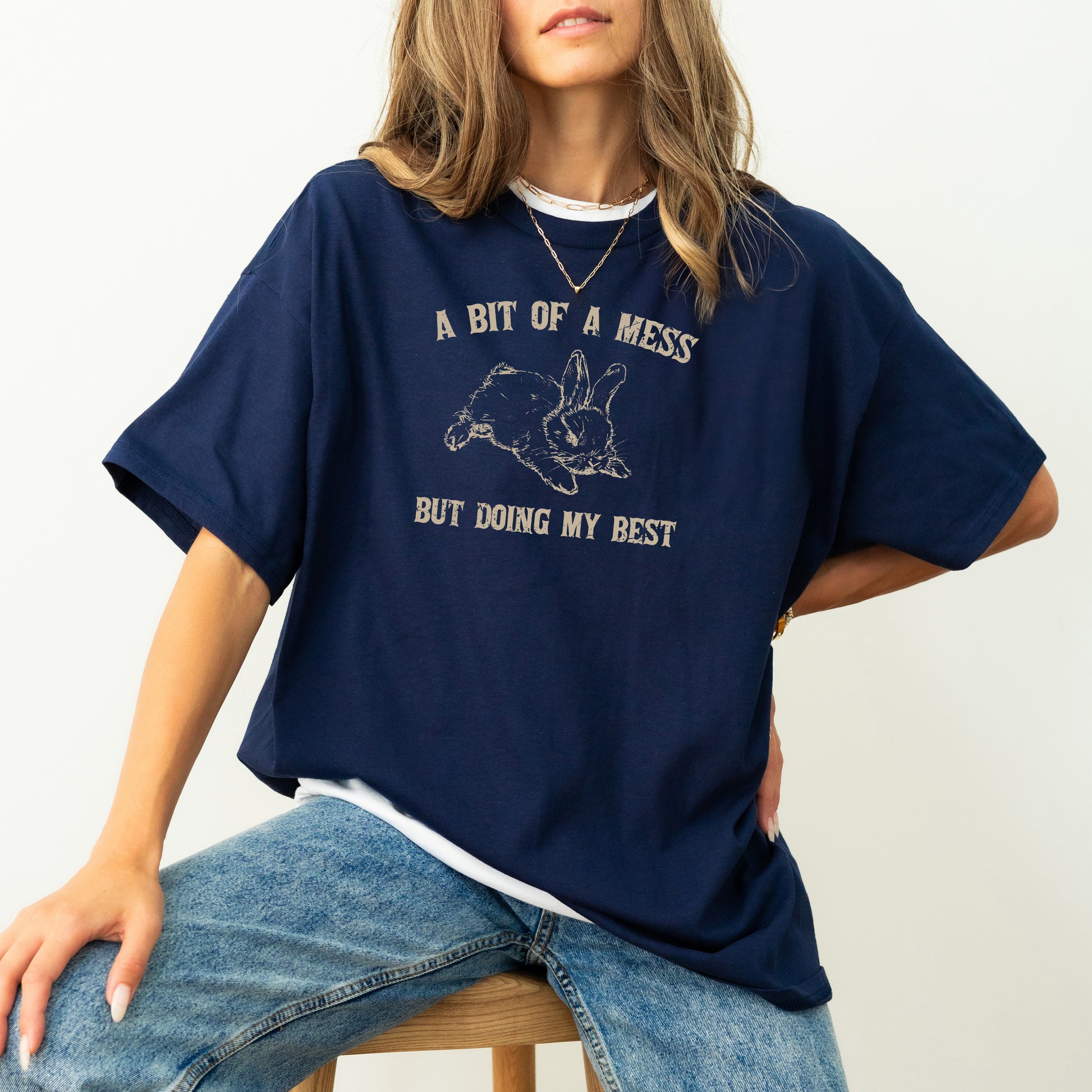 Cute bunny graphic tee featuring the phrase "A Bit Of A Mess, Doing My Best" in a funny, aesthetic style. Perfect for casual wear!