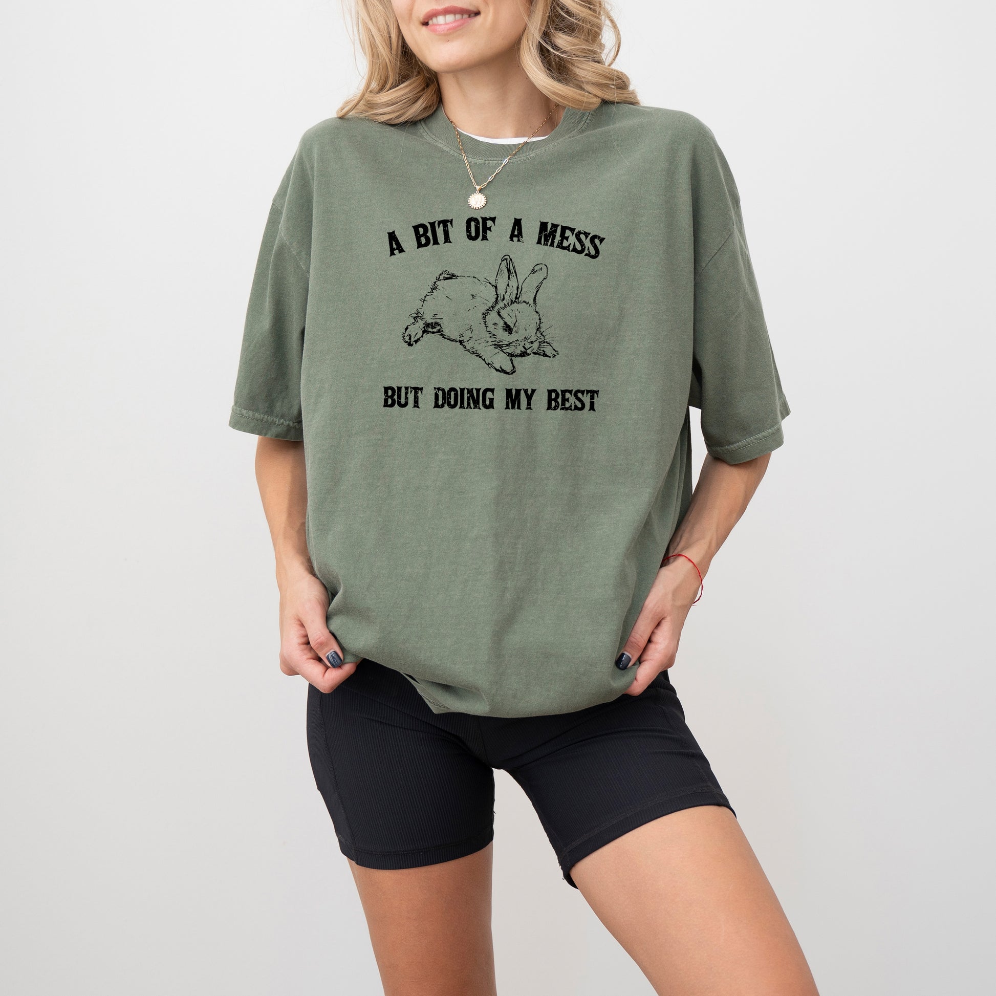 Cute bunny graphic tee featuring "A Bit Of A Mess, Doing My Best" for a funny, aesthetic vibe. Perfect for casual wear!