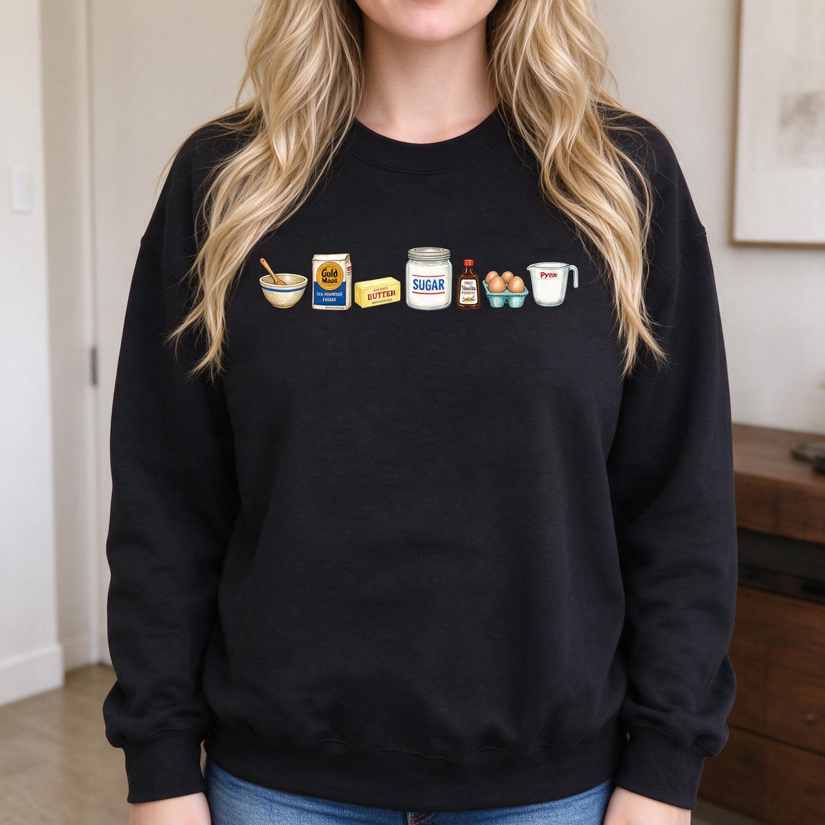 Model wearing the Baking Ingredients sweatshirt in Black