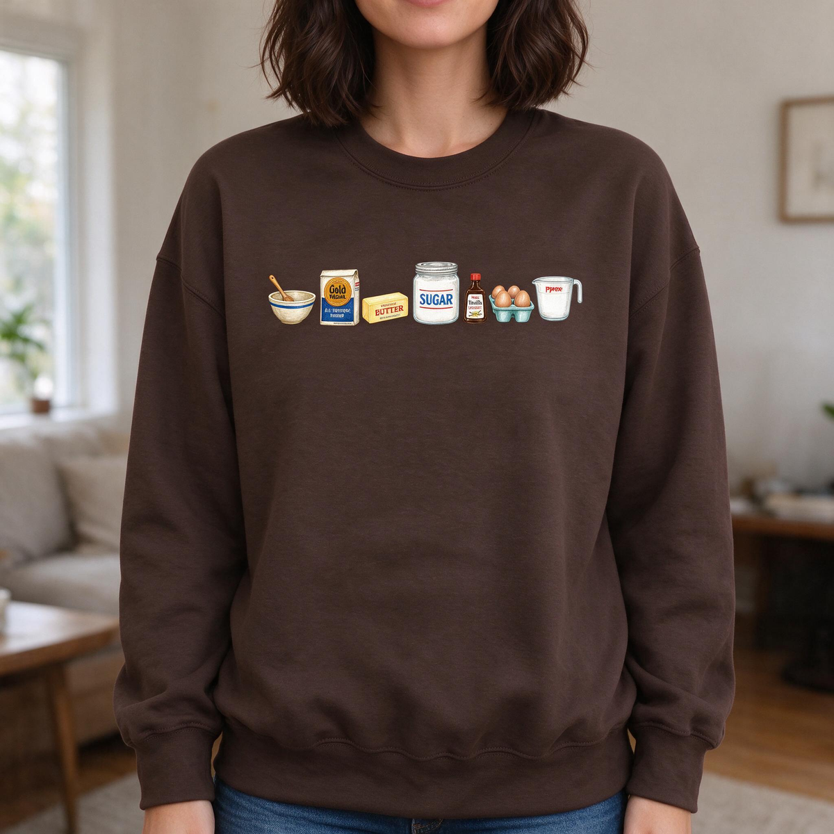 Model wearing the Baking Ingredients sweatshirt in Dark Chocolate