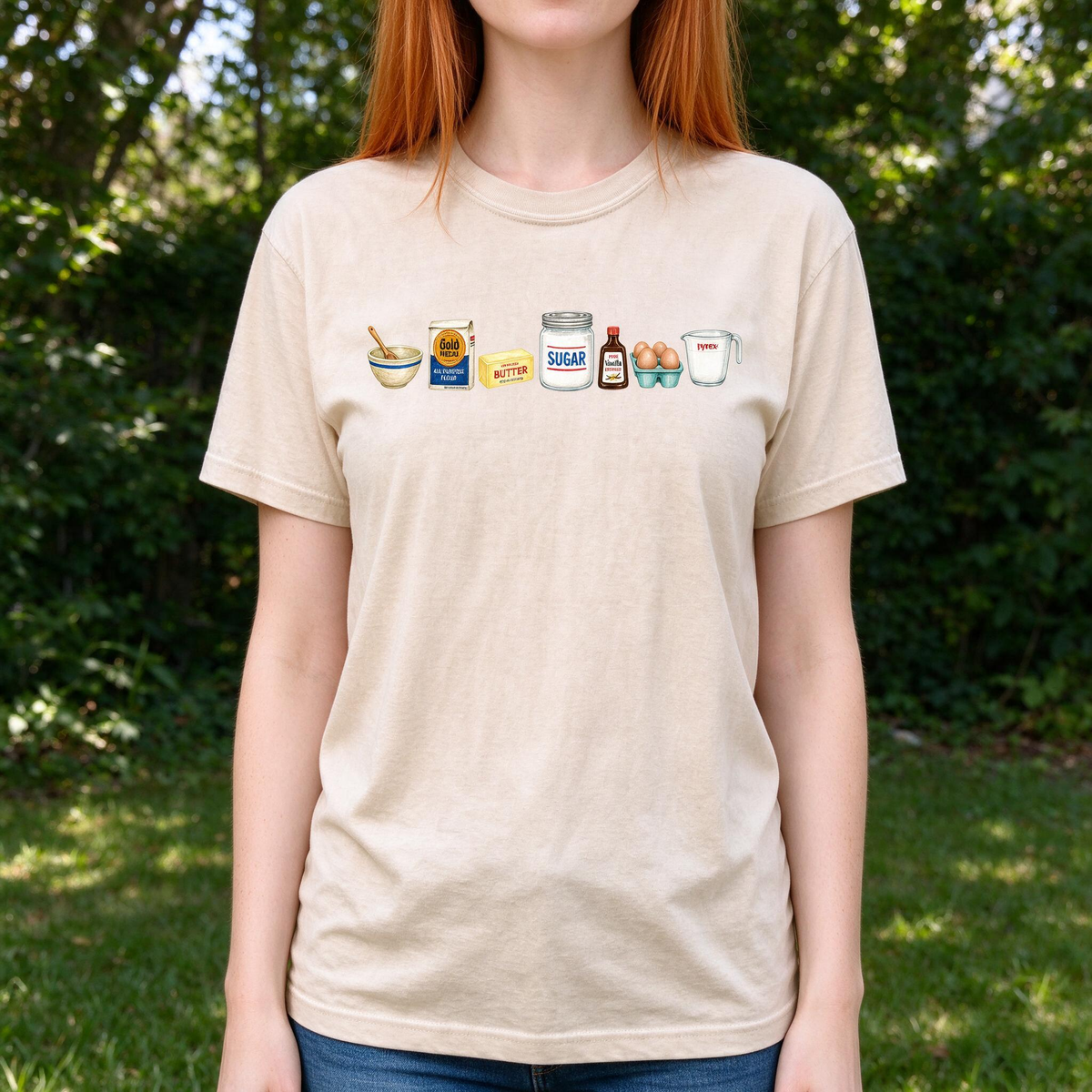 Model wearing the Baking Ingredients comfort colors tee in Ivory