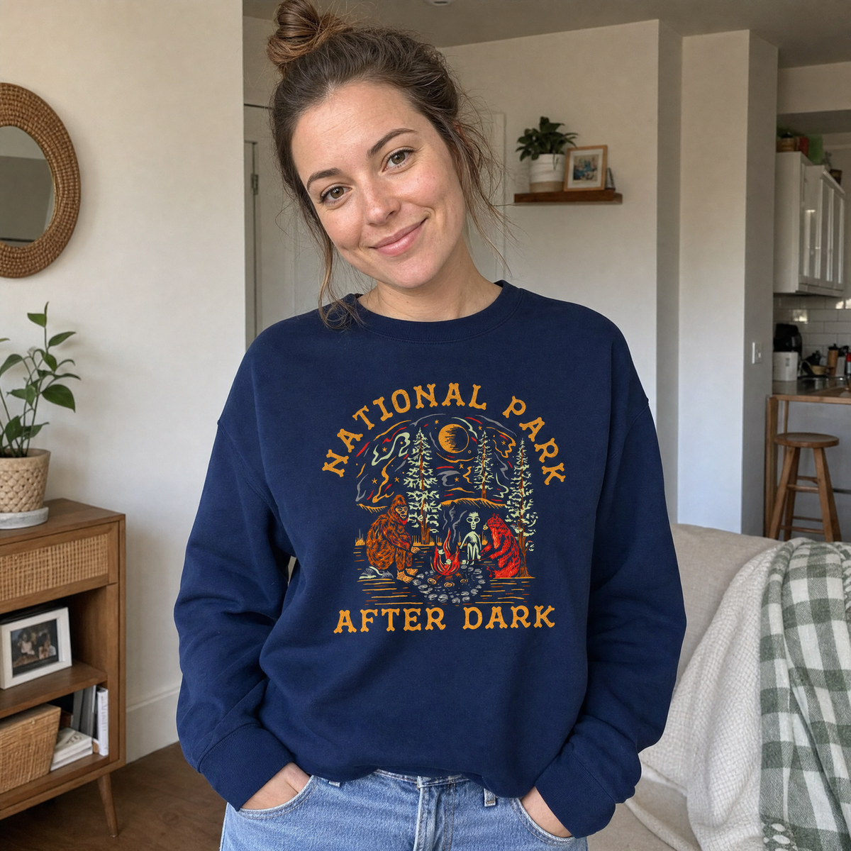 Model wearing the Bigfoot Bear Alien Campfire sweatshirt in Navy