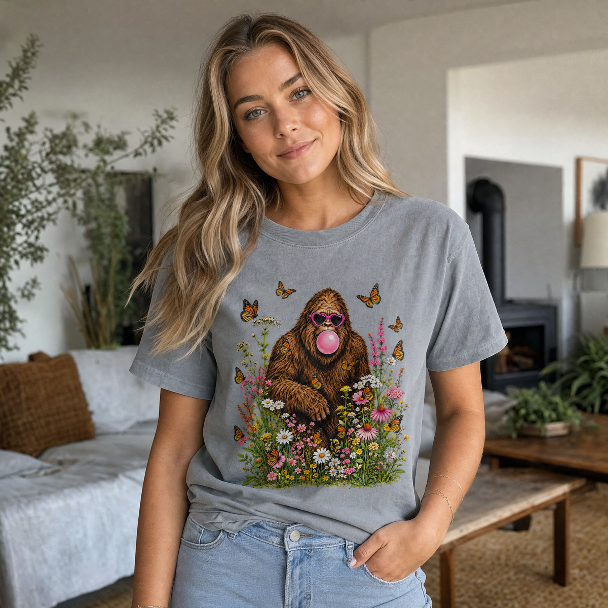 Model wearing the Bigfoot Bubble Gum comfort colors tee in Granite