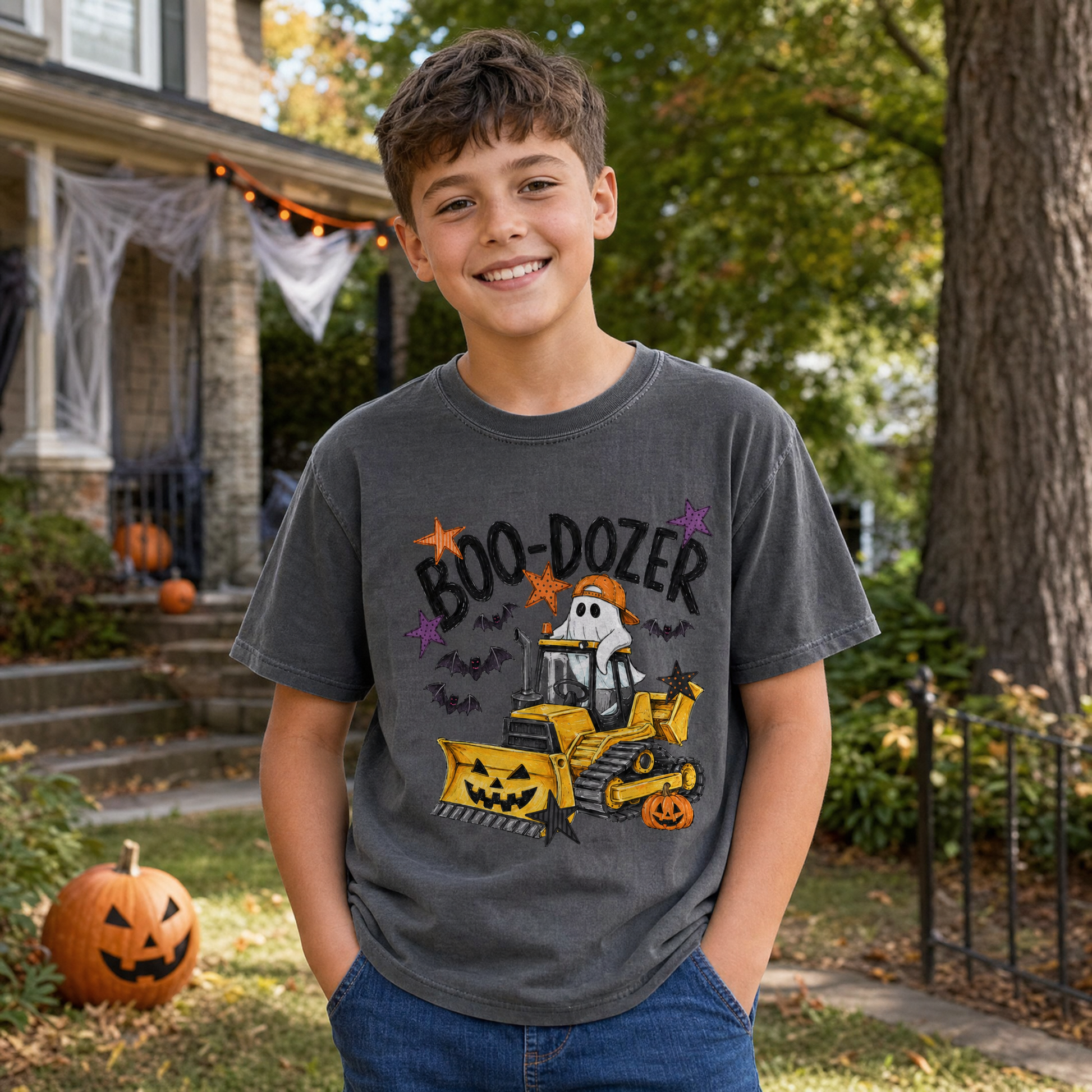 Model wearing the Boo-Dozer Ghost youth comfort colors tee in Pepper