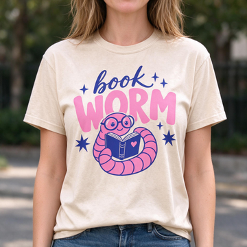 Model wearing the Book Worm comfort colors tee in Ivory, lifestyle image 1