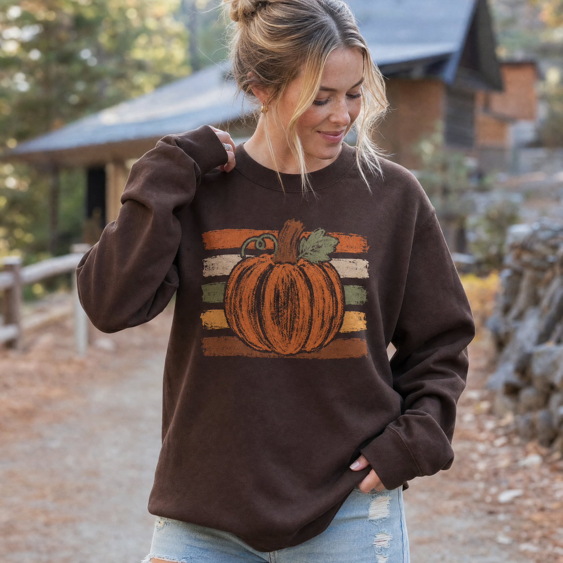 Model wearing the Brushstroke Pumpkin sweatshirt in Dark Chocolate