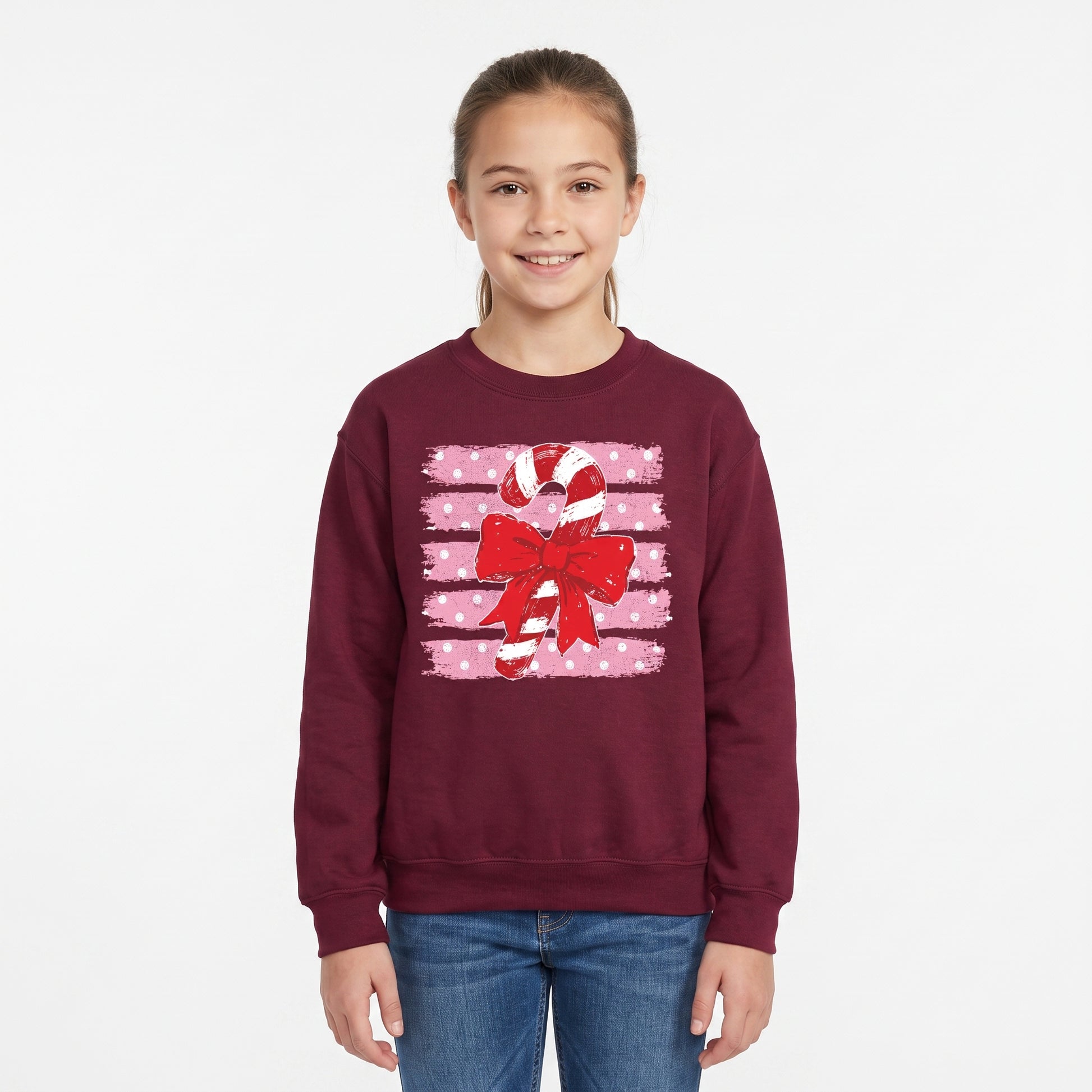 Model wearing the Candy Cane youth sweatshirt in Maroon, cover image 1