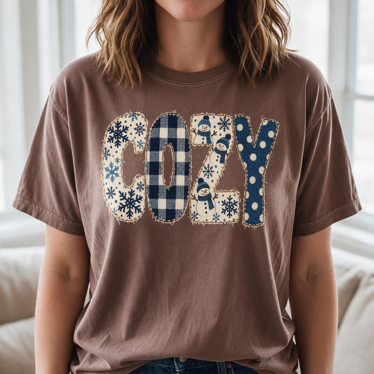 Model wearing the Cozy Snowmen comfort colors tee in Espresso