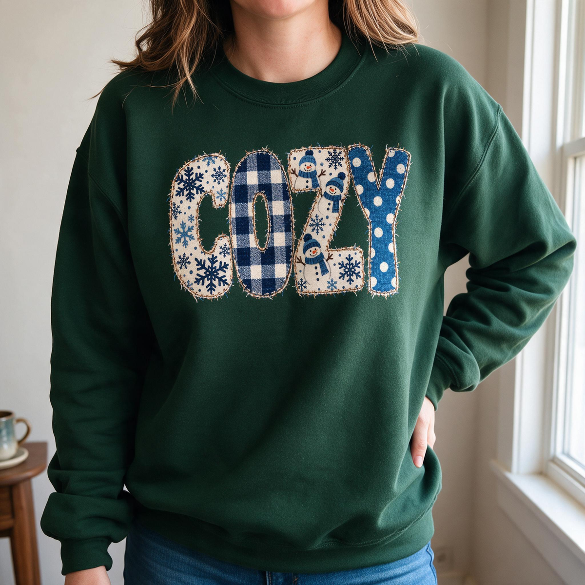 Model wearing the Cozy Snowmen sweatshirt in Forest Green