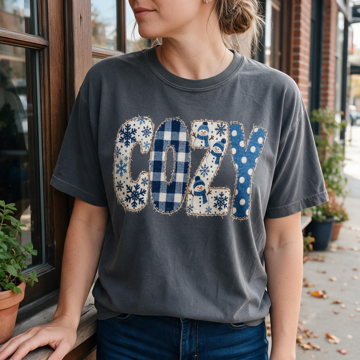 Model wearing the Cozy Snowmen comfort colors tee in Pepper