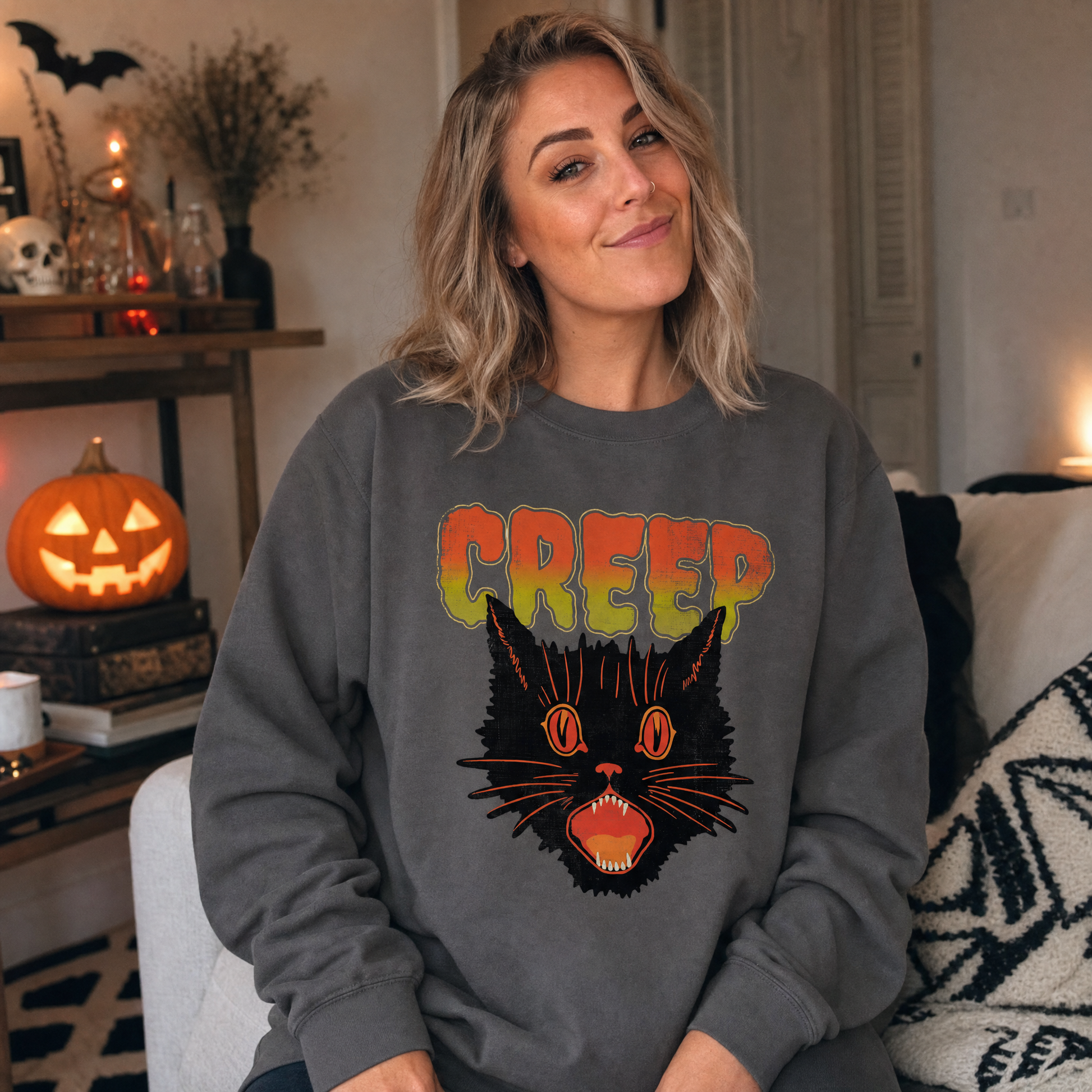 Model wearing the Creep Black Cat sweatshirt in Charcoal