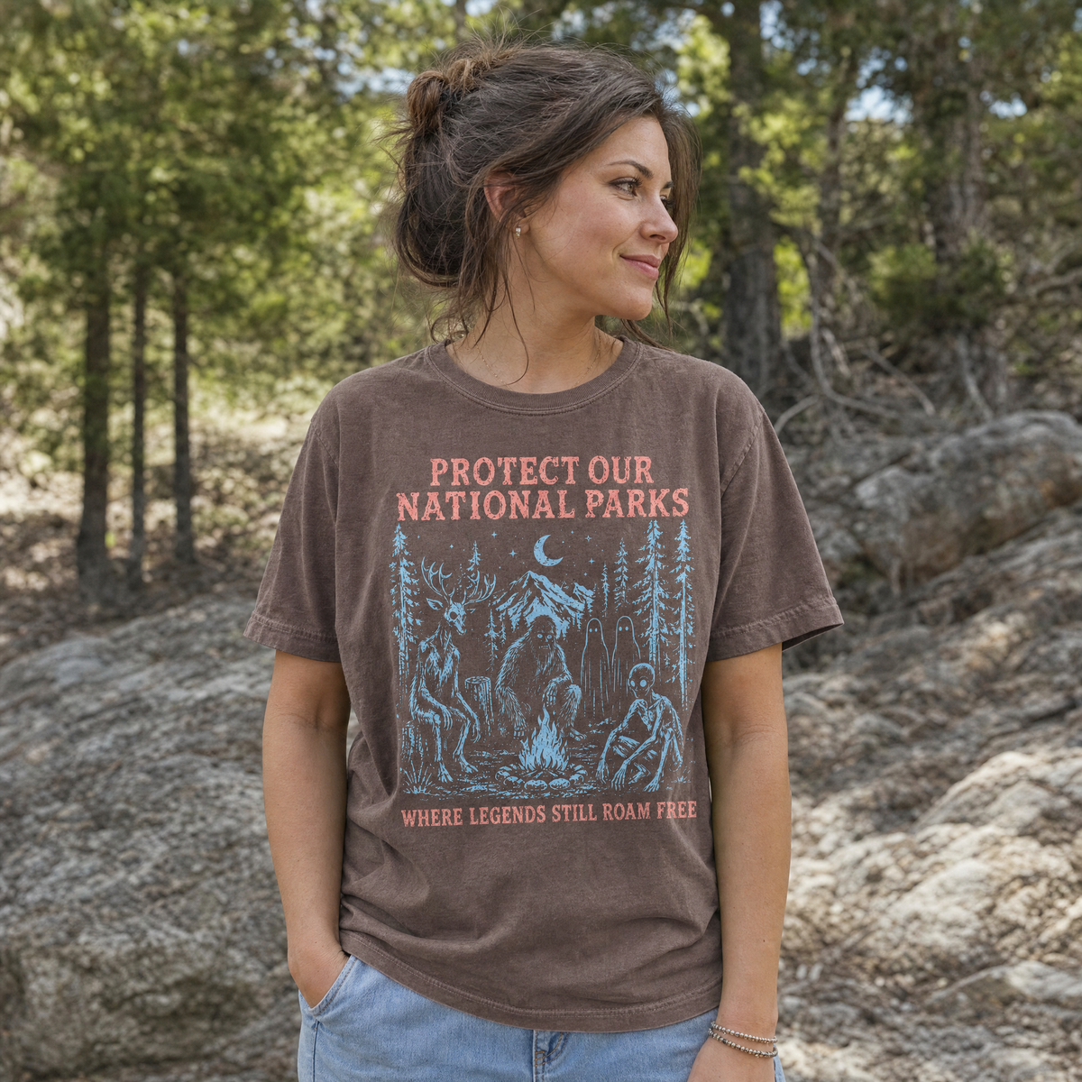 Model wearing the Cryptid Campfire comfort colors tee in Espresso