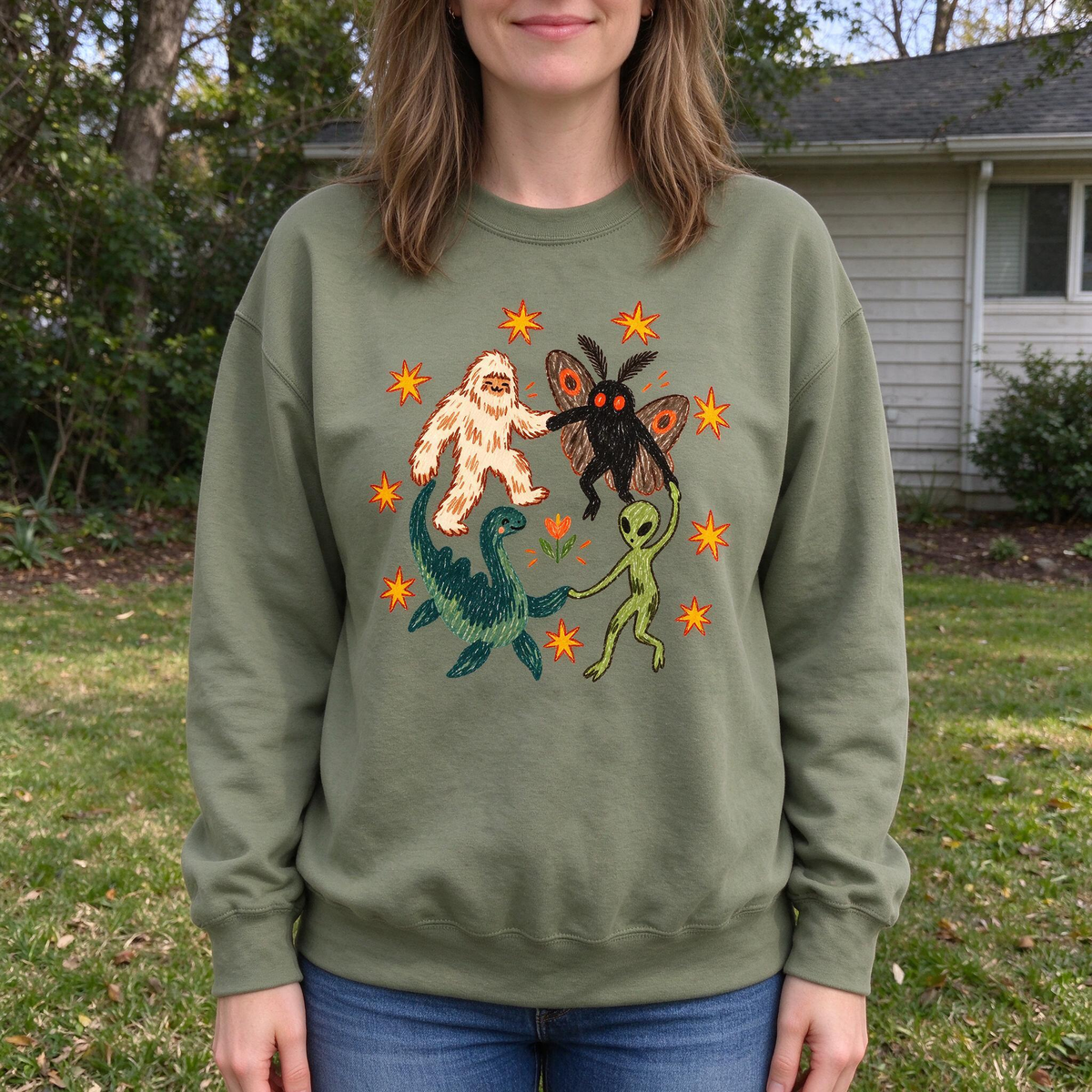 Model wearing the Cryptid Dance Party sweatshirt in Military Green