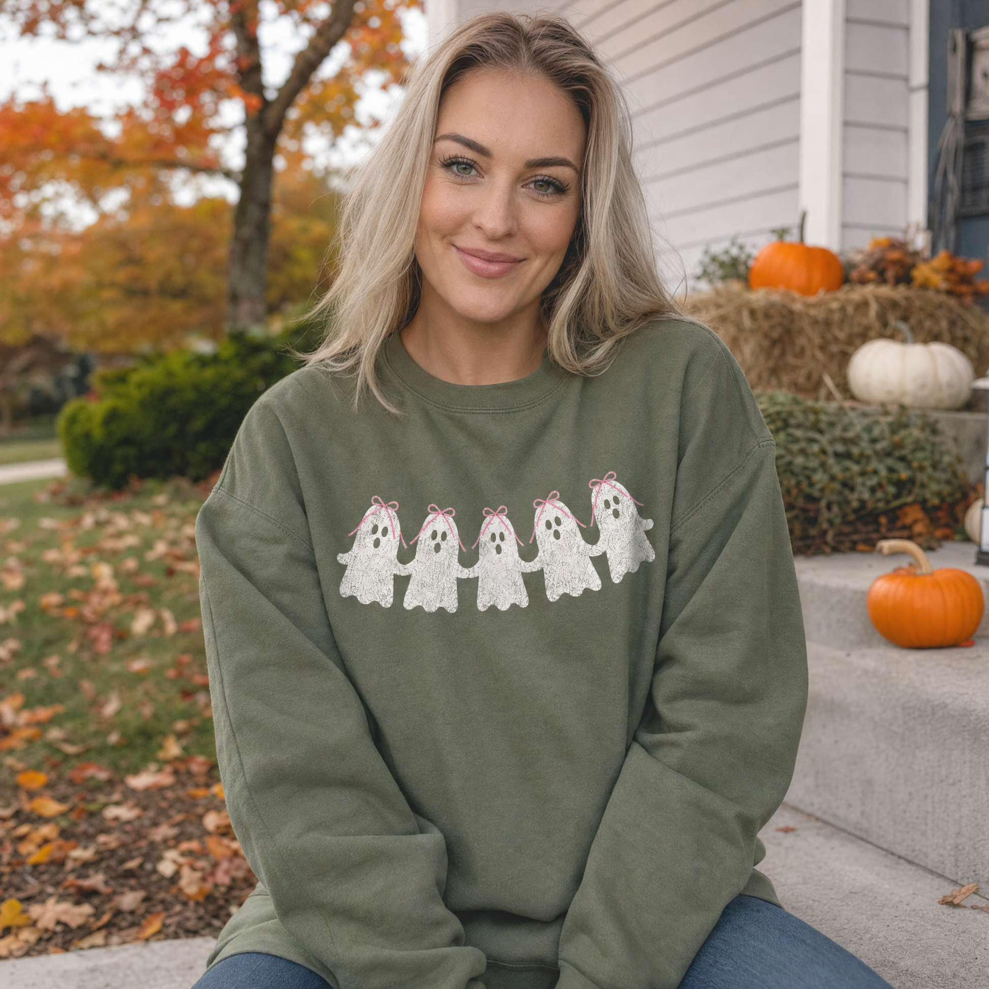 Model wearing the Cute Ghosts sweatshirt in Military Green