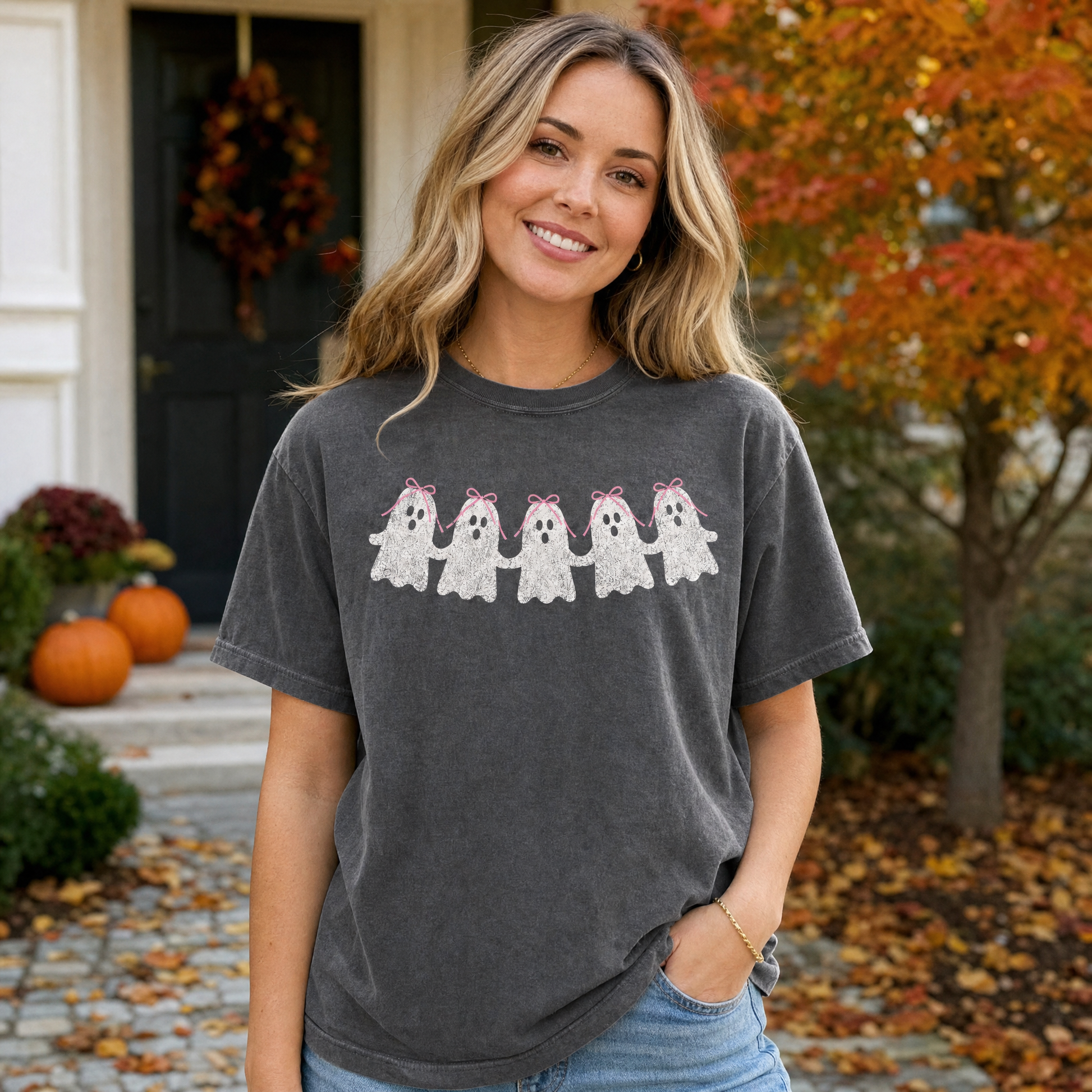 Model wearing the Cute Ghosts comfort colors tee in Pepper, lifestyle image 1