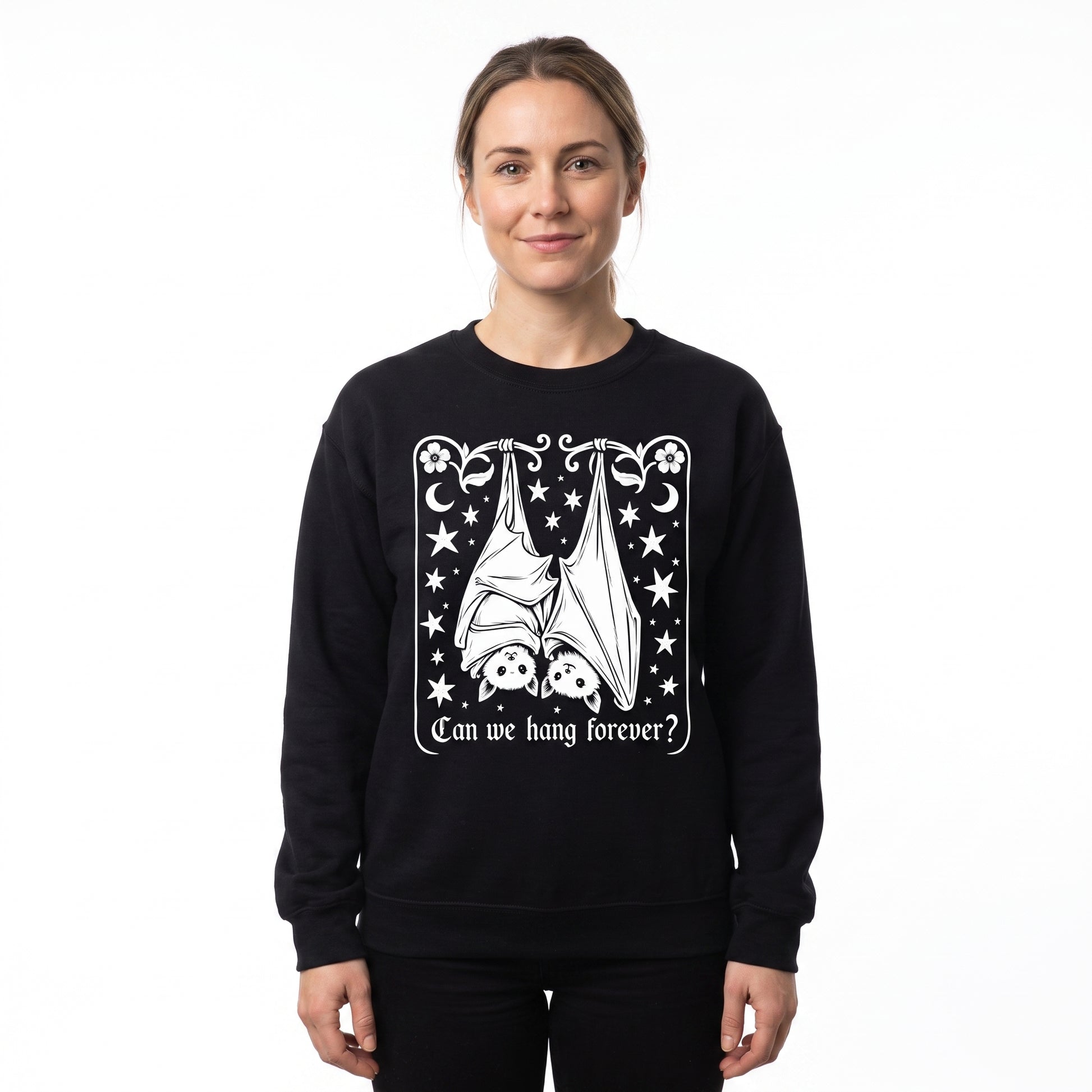 Model wearing the Cute Hanging Bats sweatshirt in Black, cover image 1