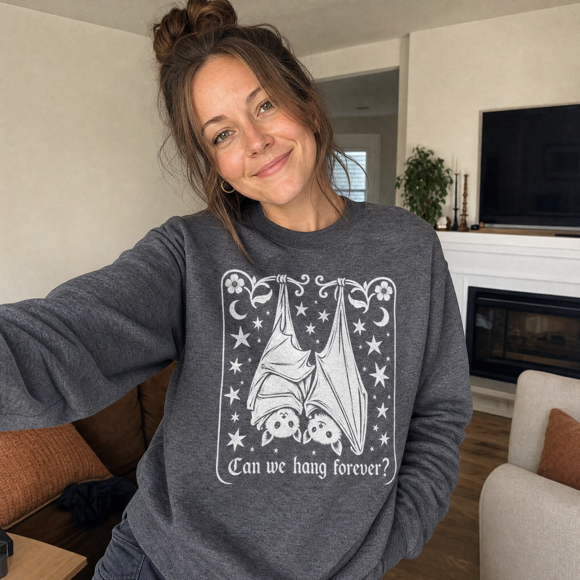Model wearing the Cute Hanging Bats sweatshirt in Dark Heather