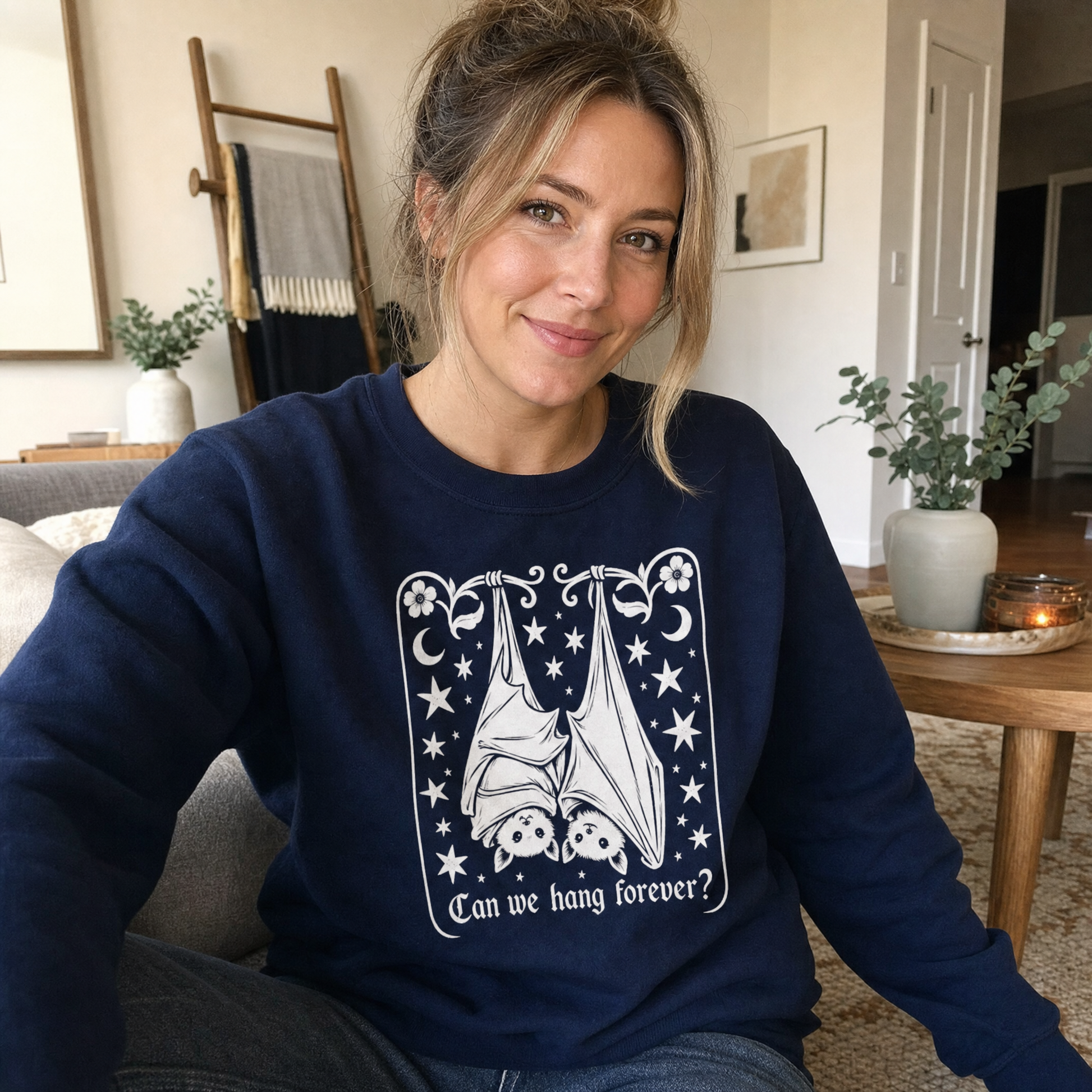 Model wearing the Cute Hanging Bats sweatshirt in Navy