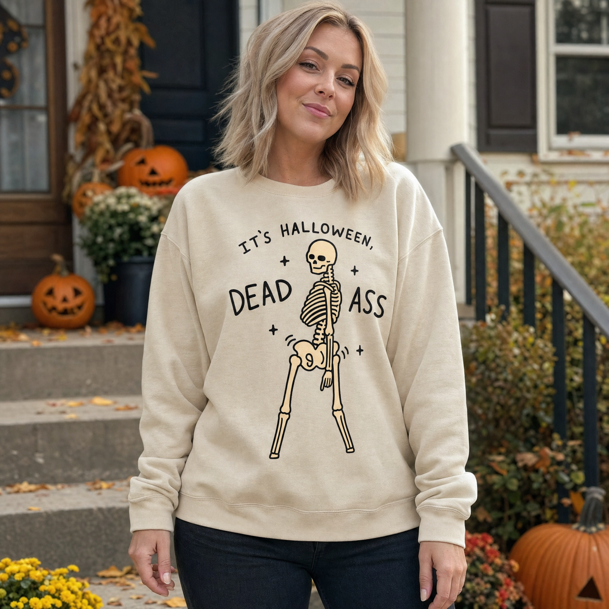 Model wearing the Dancing Skeleton sweatshirt in Sand