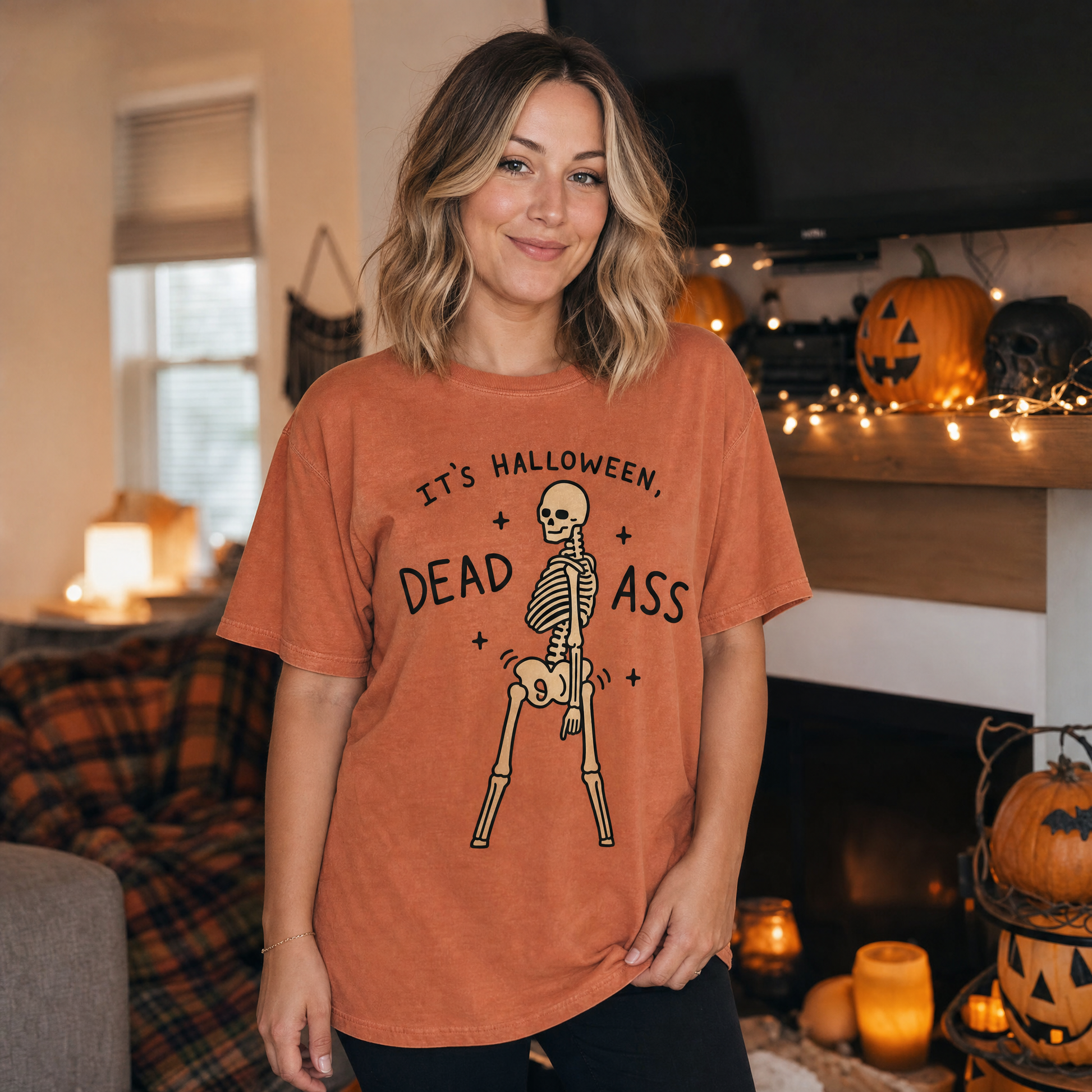 Model wearing the Dancing Skeleton comfort colors tee in Yam, lifestyle image 1