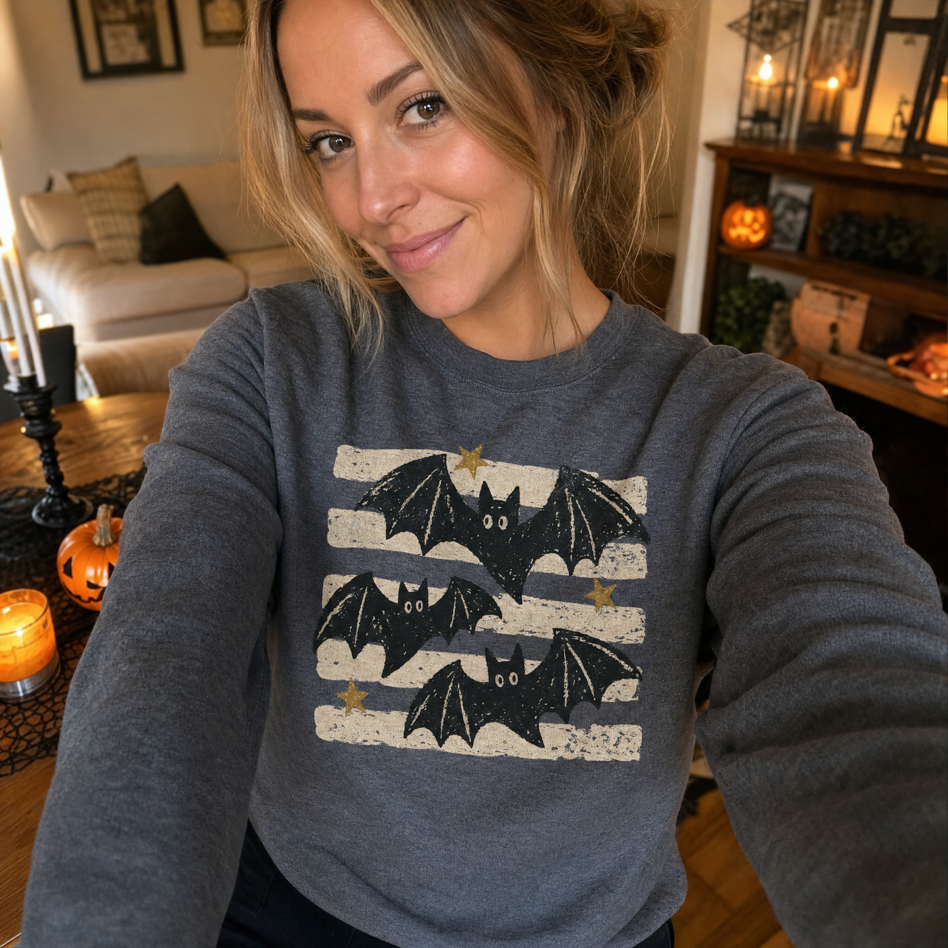 Model wearing the Distressed Bats sweatshirt in Dark Heather