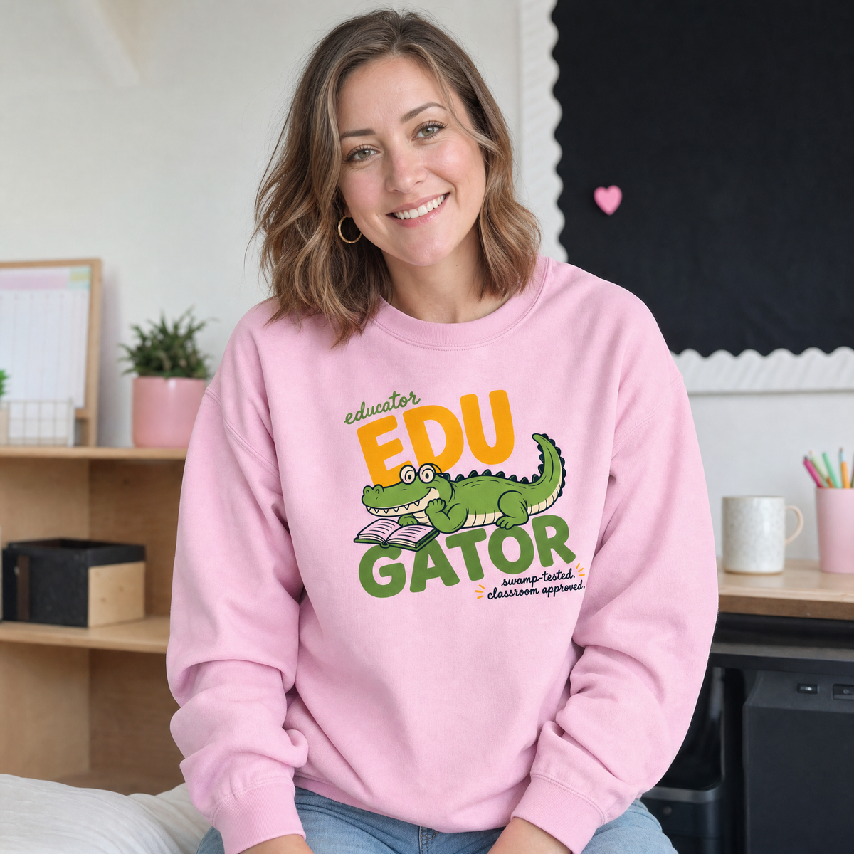 Model wearing the EduGator sweatshirt in Light Pink
