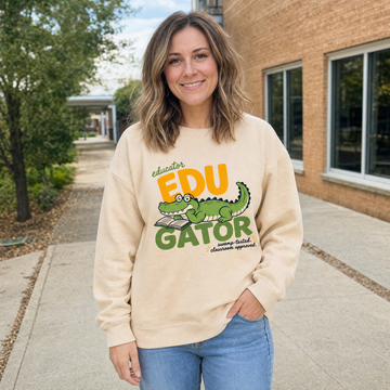 Model wearing the EduGator sweatshirt in Sand