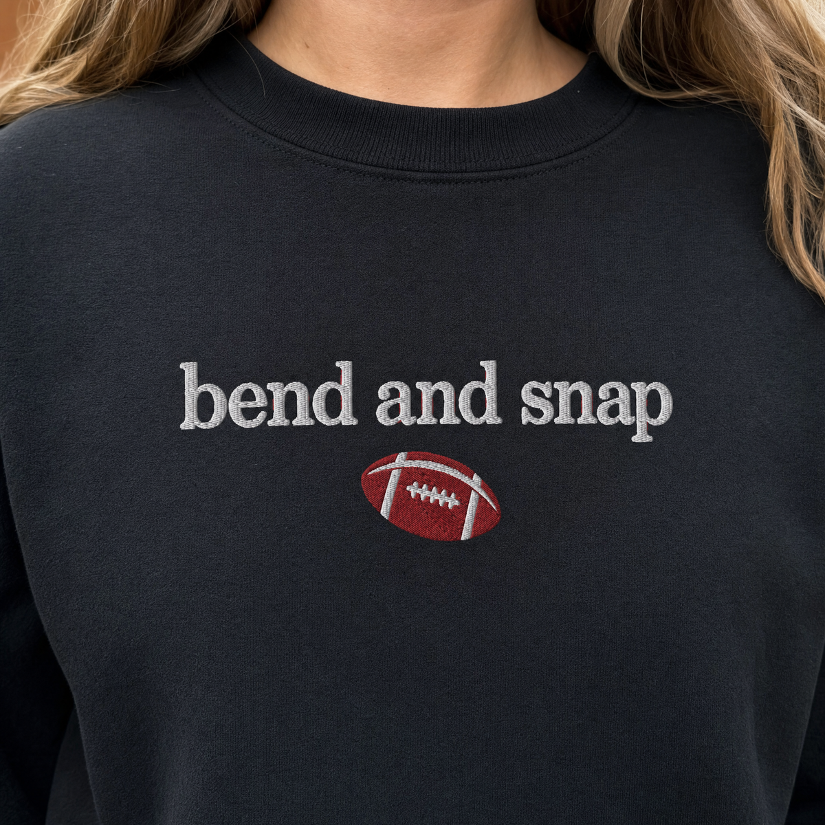 Model wearing the Bend and Snap sweatshirt in Black, lifestyle image 1