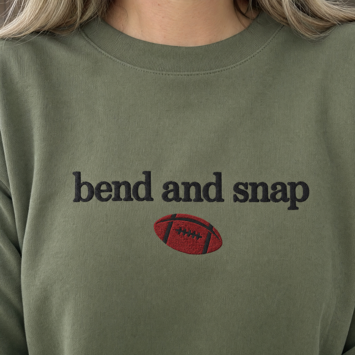 Model wearing the Bend and Snap sweatshirt in Military Green, lifestyle image 2