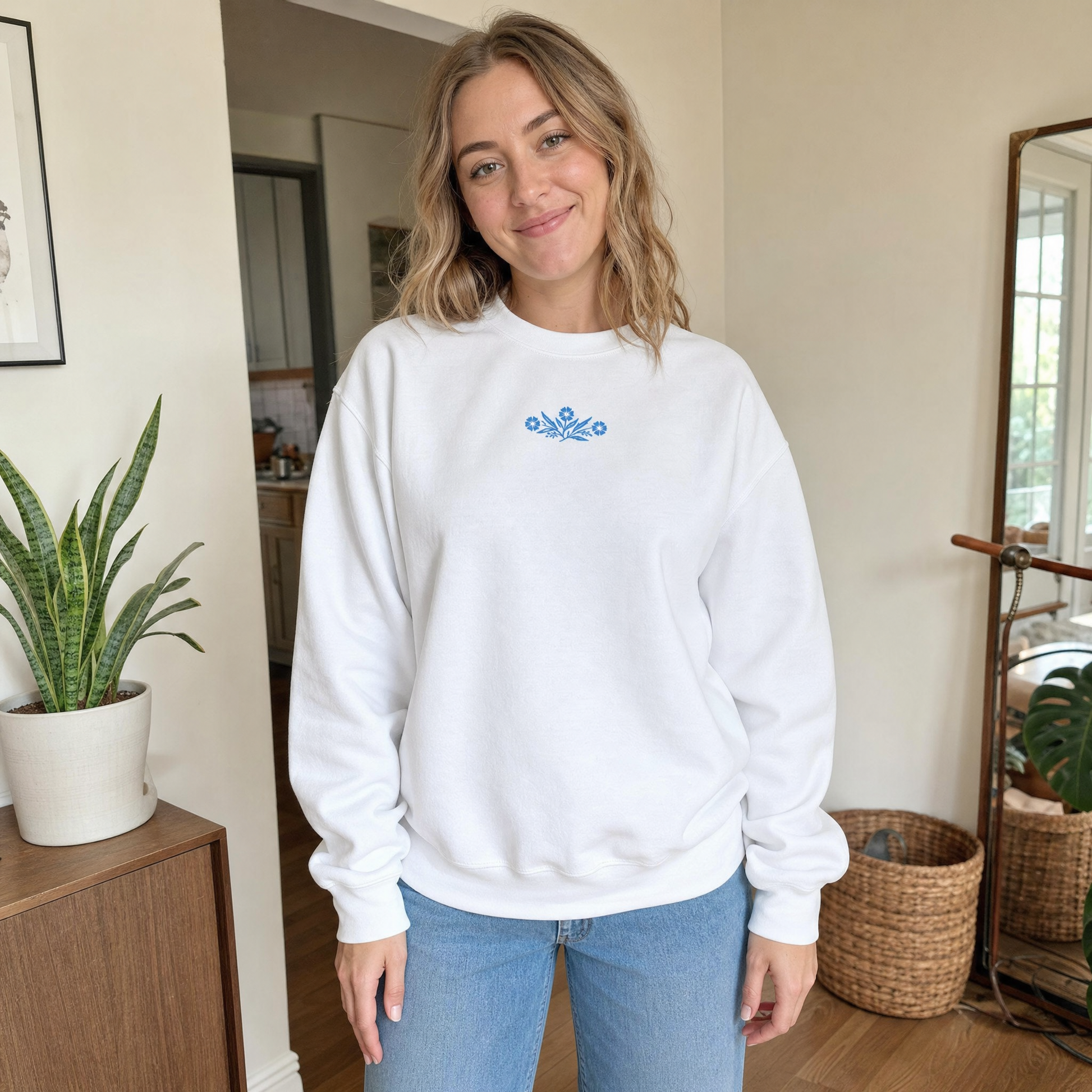 Model wearing the Cornflower Blue Flowers sweatshirt in White, lifestyle image 1