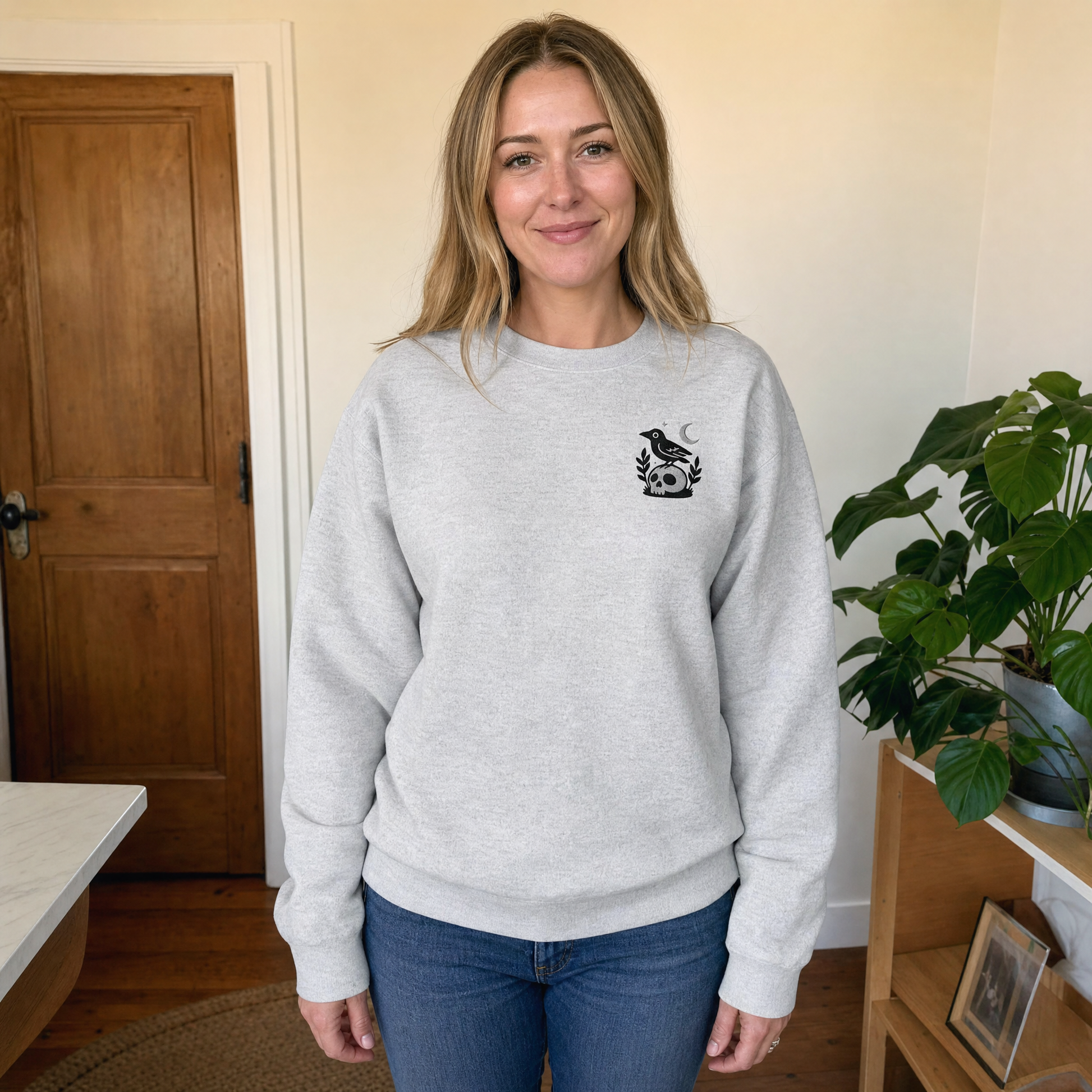 Model wearing the Crow on Skull sweatshirt in Ash, cover image 1