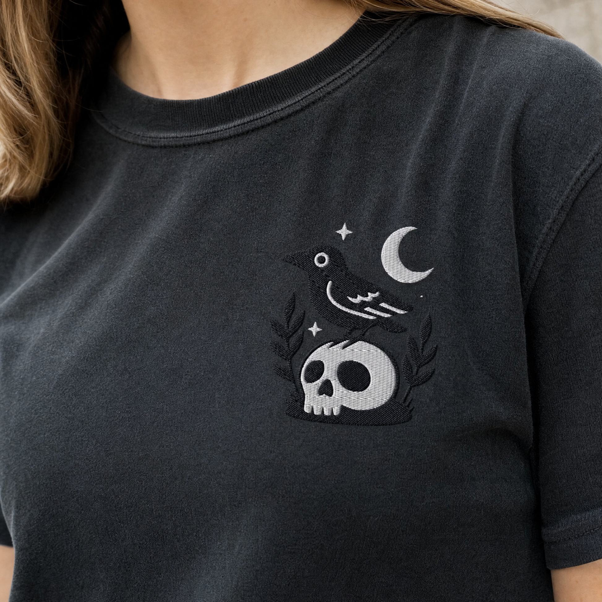Model wearing the Crow on Skull comfort colors tee in Black, lifestyle image 2