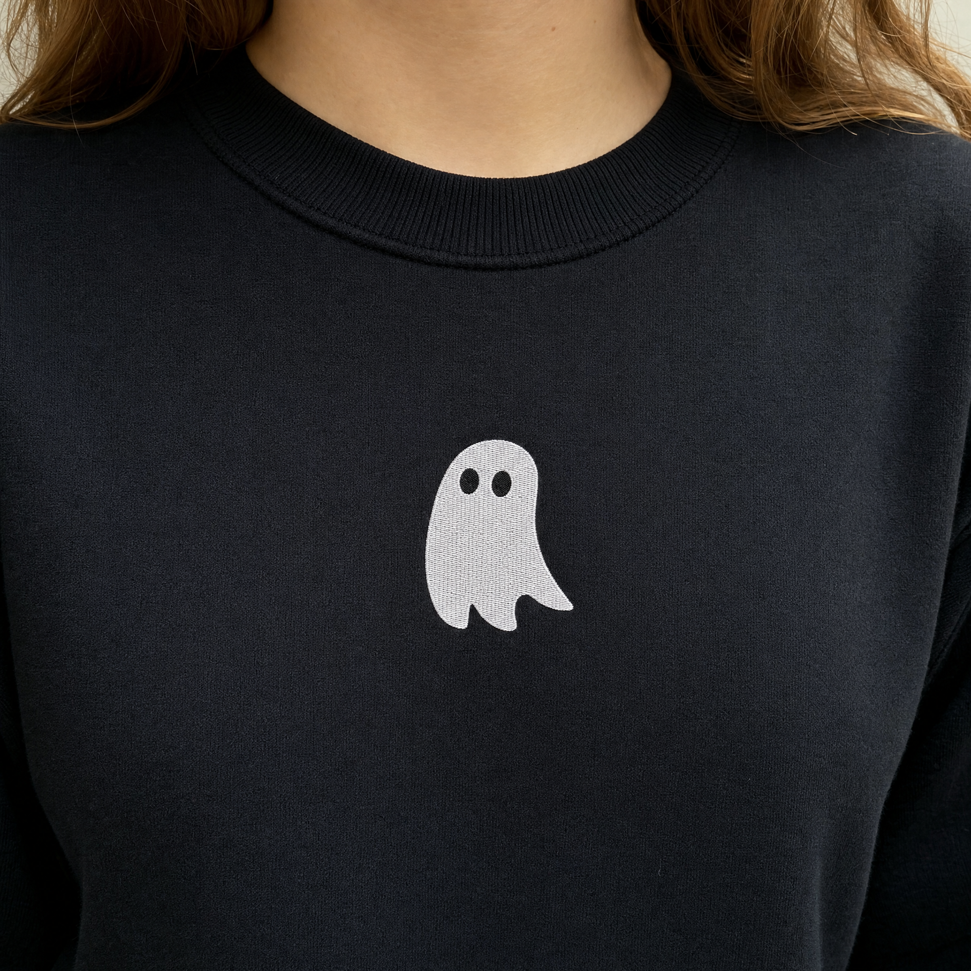 Model wearing the Cute Ghost sweatshirt in Black, lifestyle image 1