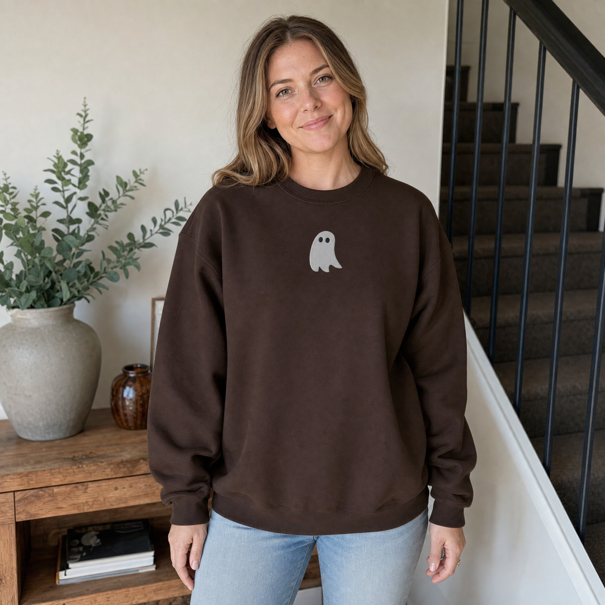 Model wearing the Cute Ghost sweatshirt in Dark Chocolate, lifestyle image 1