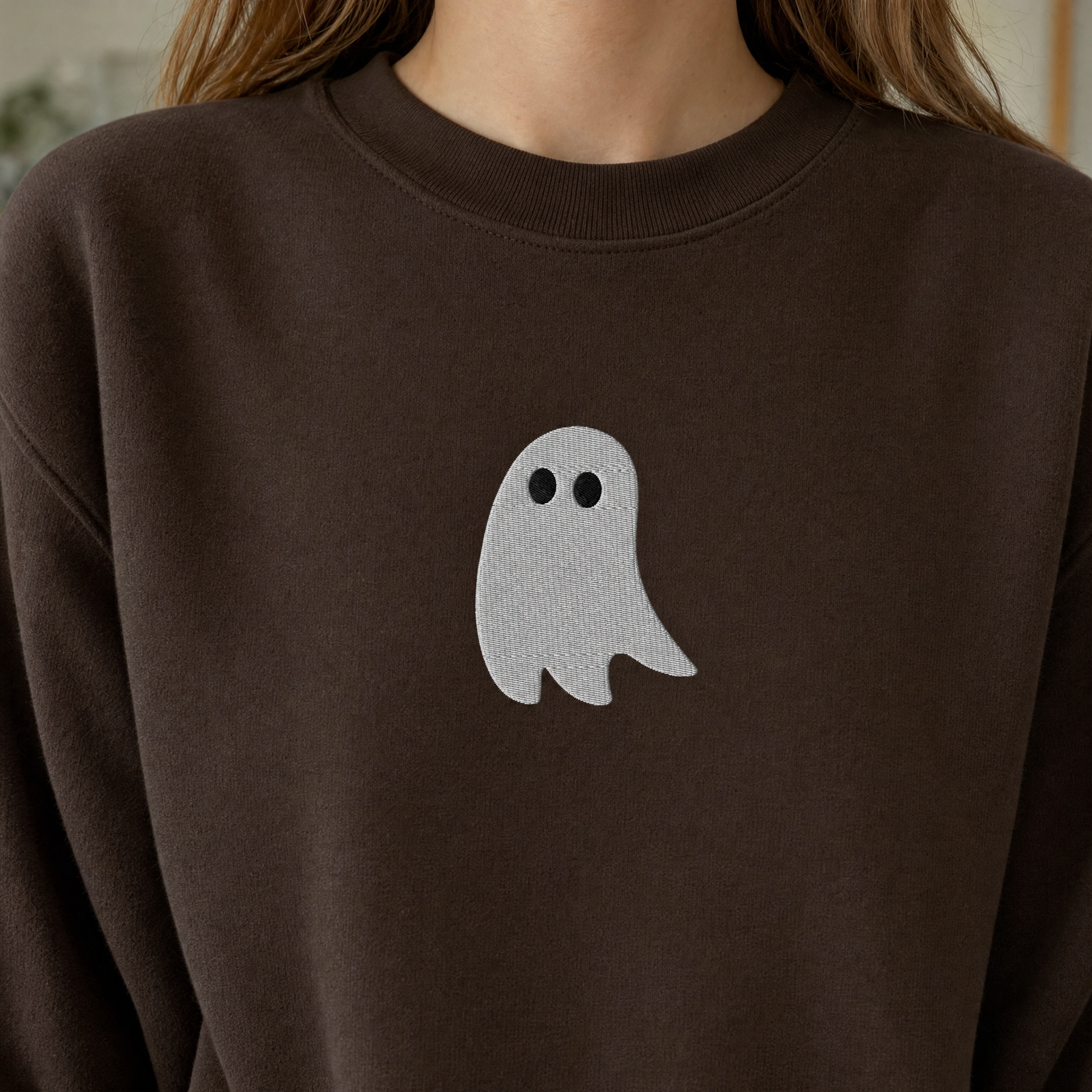 Model wearing the Cute Ghost sweatshirt in Dark Chocolate, lifestyle image 2