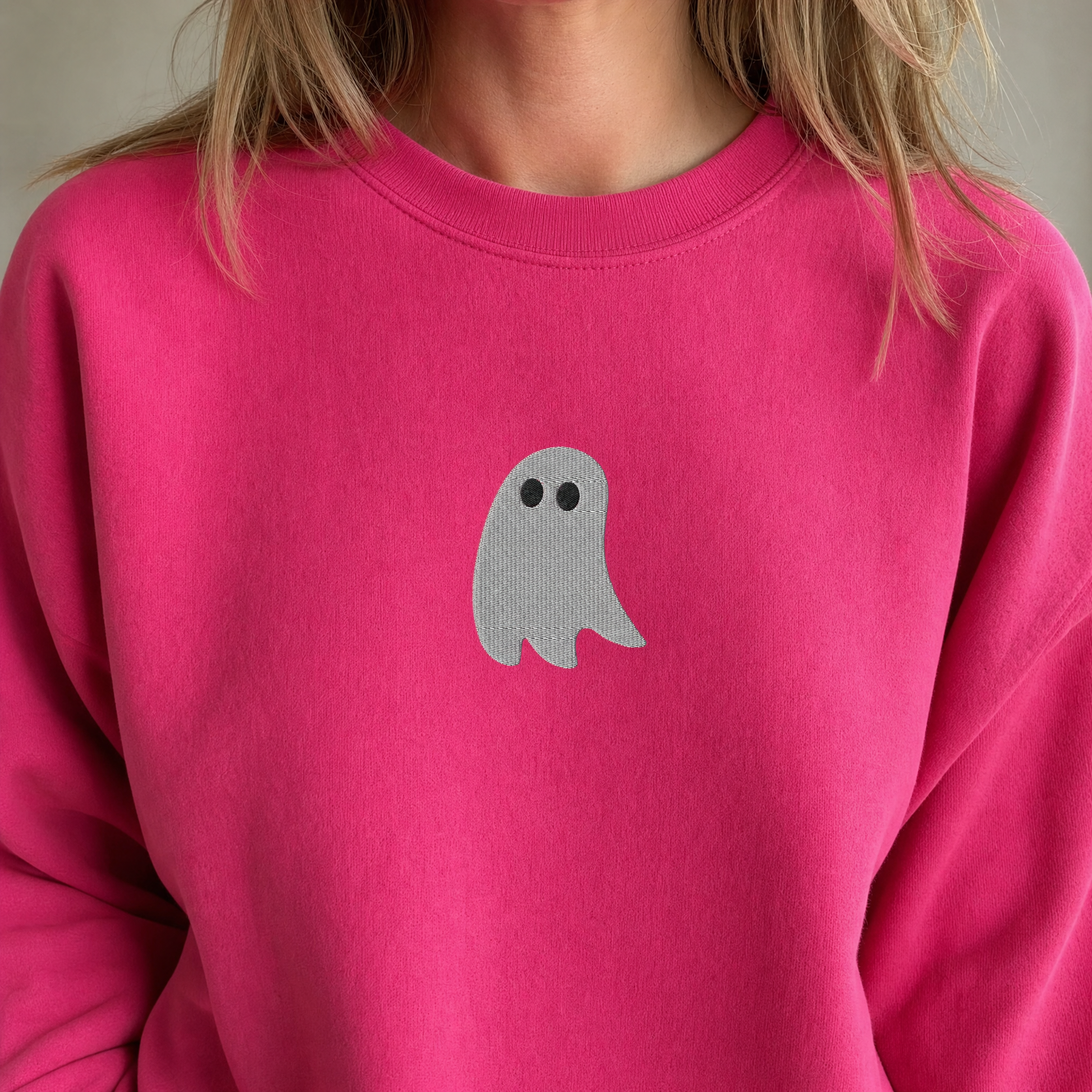 Model wearing the Cute Ghost sweatshirt in Heliconia, lifestyle image 2
