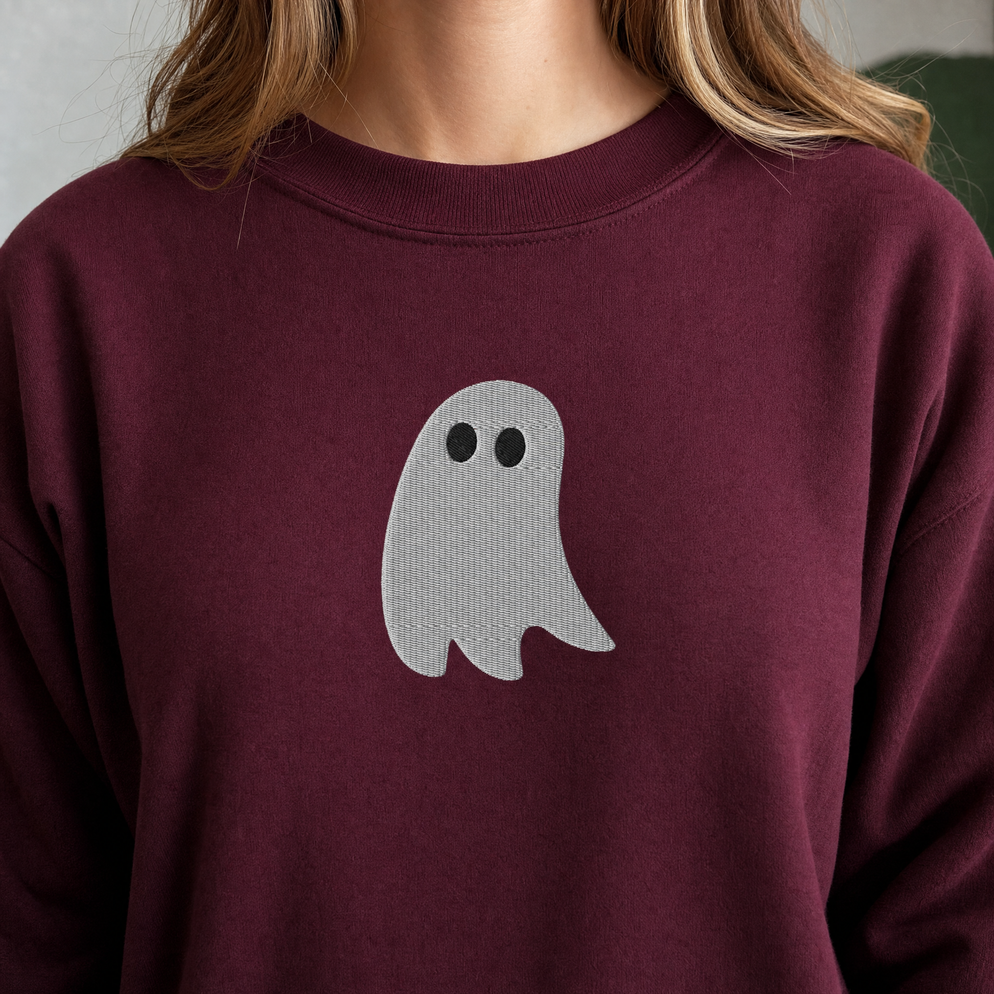 Model wearing the Cute Ghost sweatshirt in Maroon, lifestyle image 2