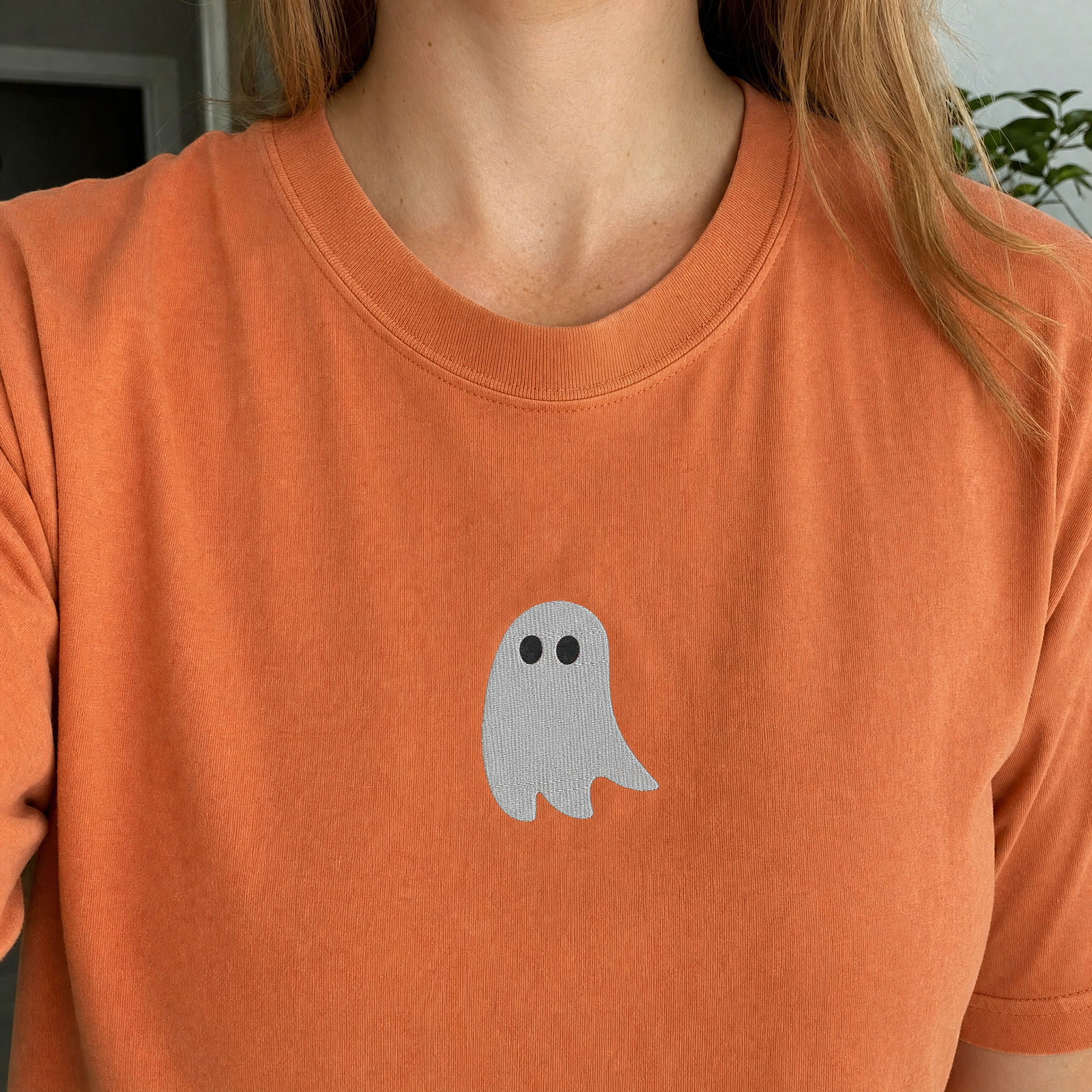 Model wearing the Cute Ghost comfort colors tee in Yam, lifestyle image 1