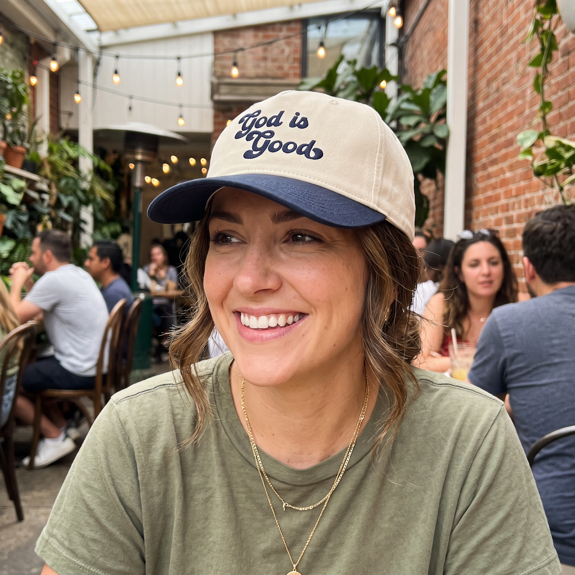 God is Good embroidered hat in Navy/natural worn lifestyle photo
