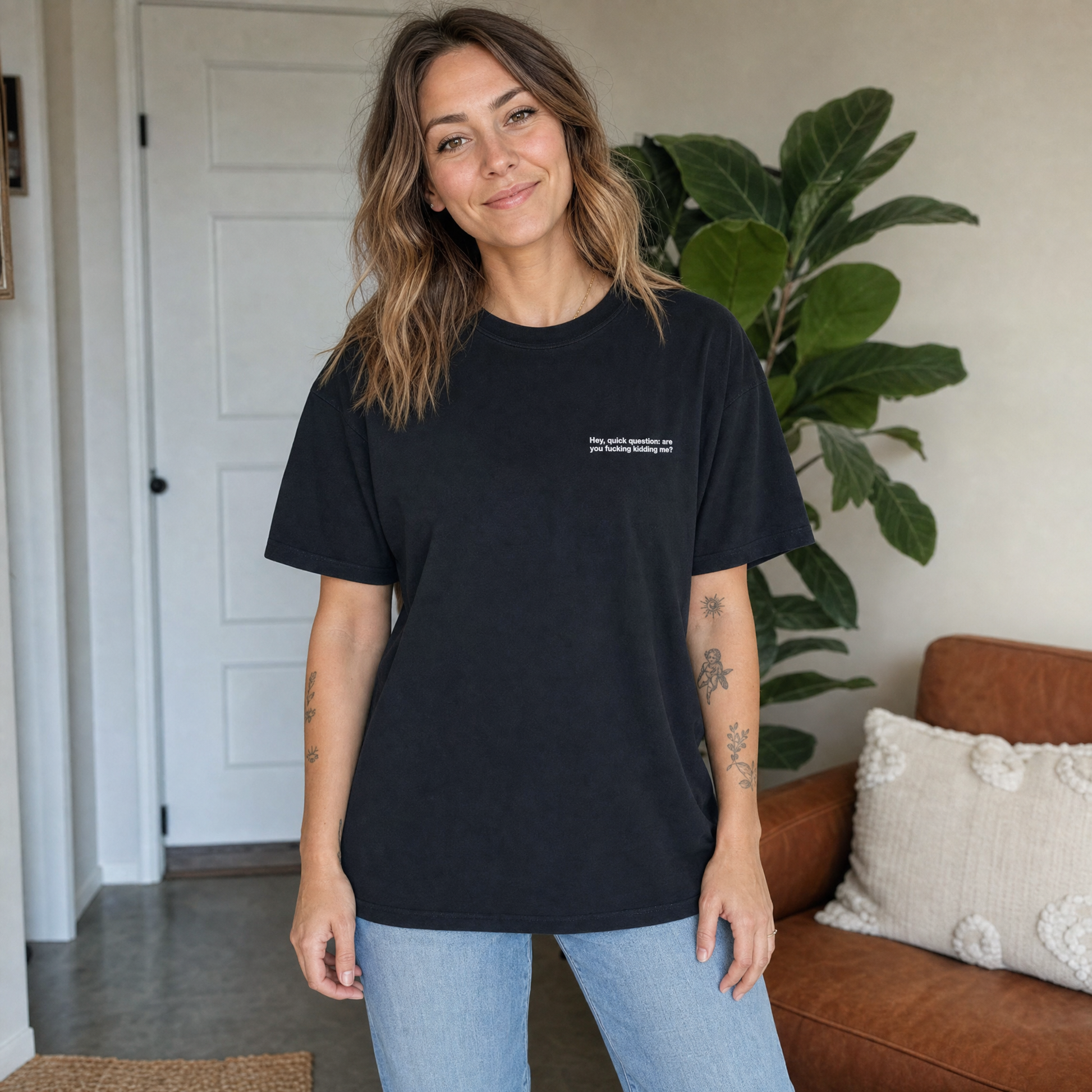Model wearing the Hey Quick Question comfort colors tee in Black, lifestyle image 1