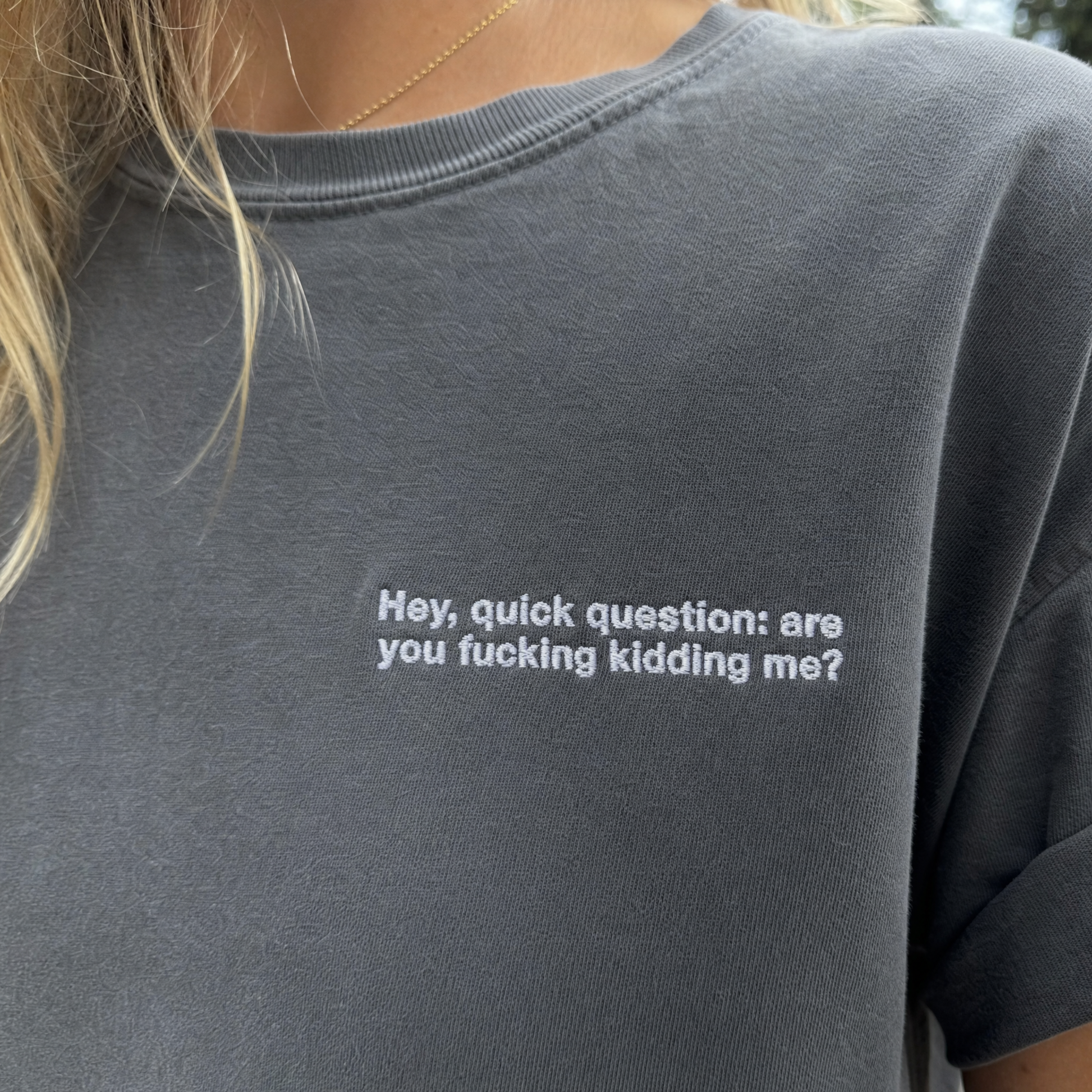 Model wearing the Hey Quick Question comfort colors tee in Pepper, lifestyle image 1