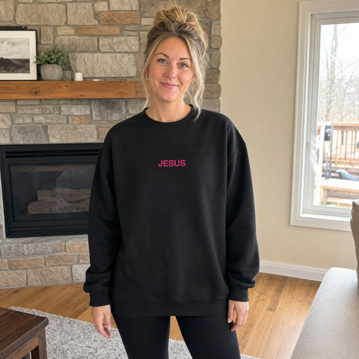 Model wearing the JESUS Pink Lettering Sweatshirt sweatshirt in Black, cover image 1