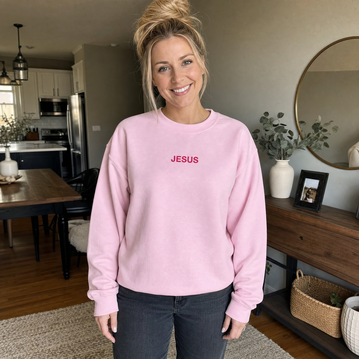 Model wearing the JESUS Pink Lettering Sweatshirt sweatshirt in Light Pink, lifestyle image 1