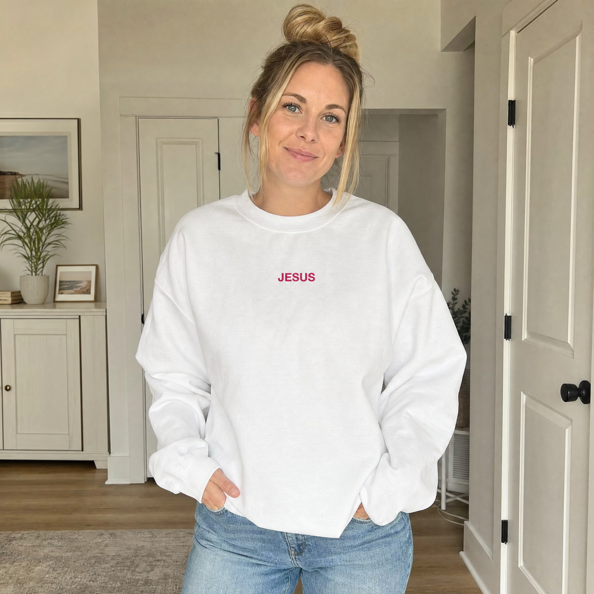 Model wearing the JESUS Pink Lettering Sweatshirt sweatshirt in White, lifestyle image 1