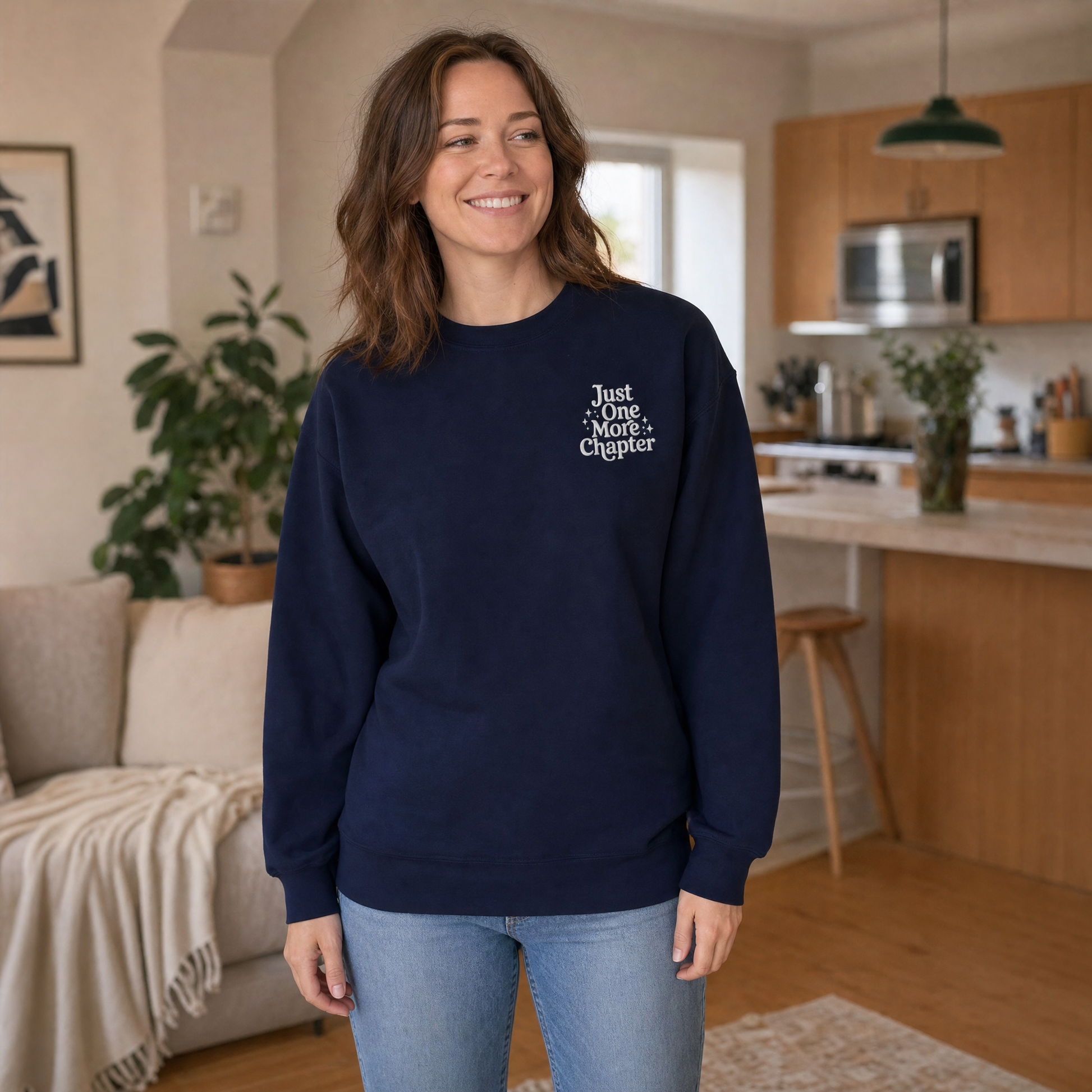 Model wearing the Just One More Chapter sweatshirt in Navy, cover image 1