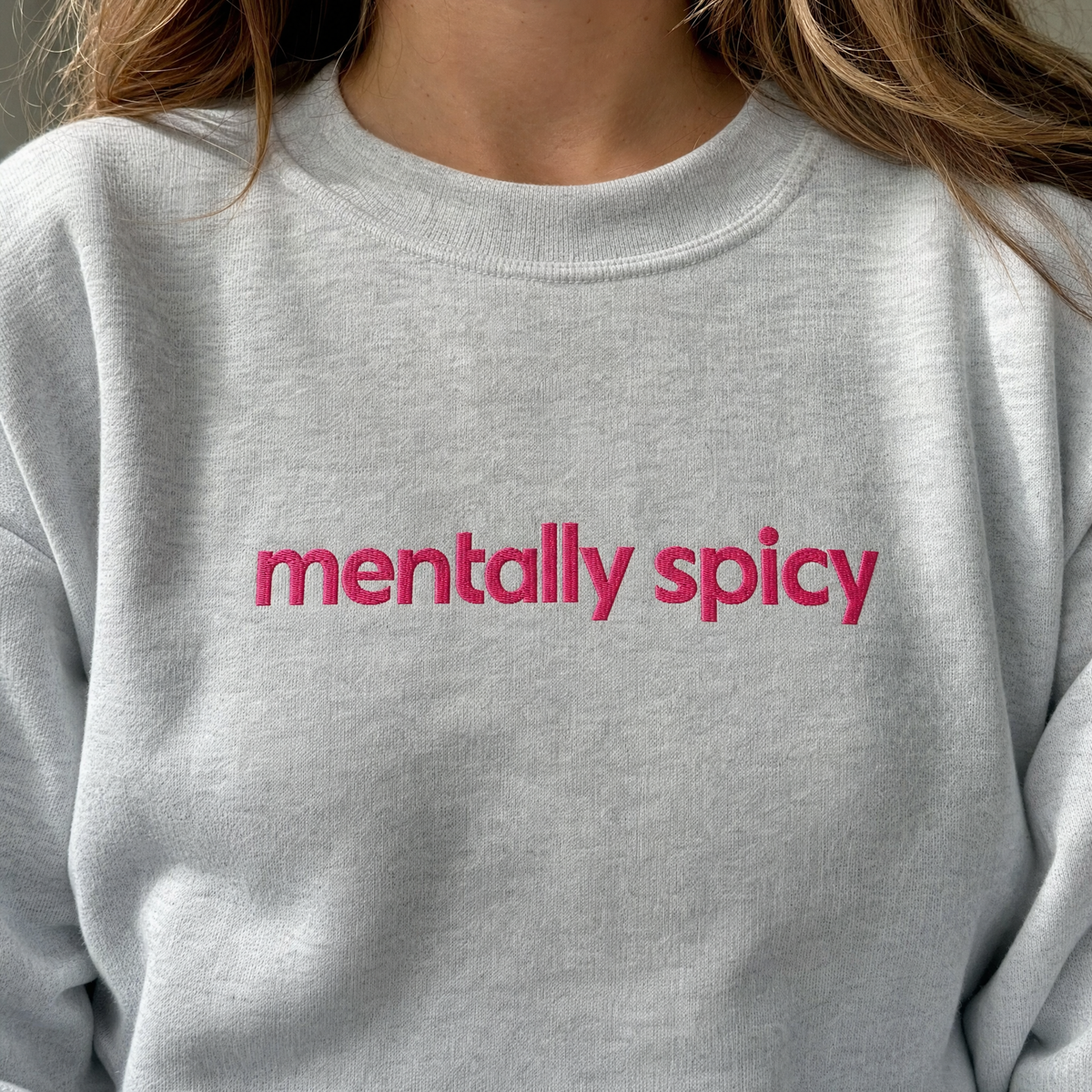 Model wearing the Mentally Spicy sweatshirt in Ash, lifestyle image 2