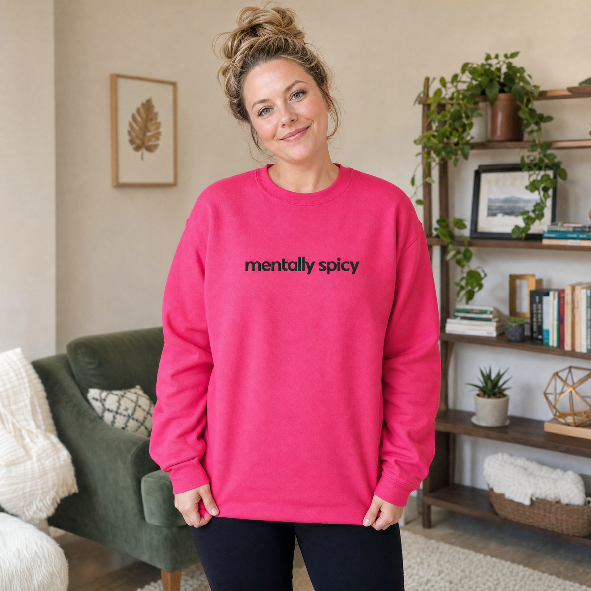 Model wearing the Mentally Spicy sweatshirt in Heliconia, lifestyle image 1