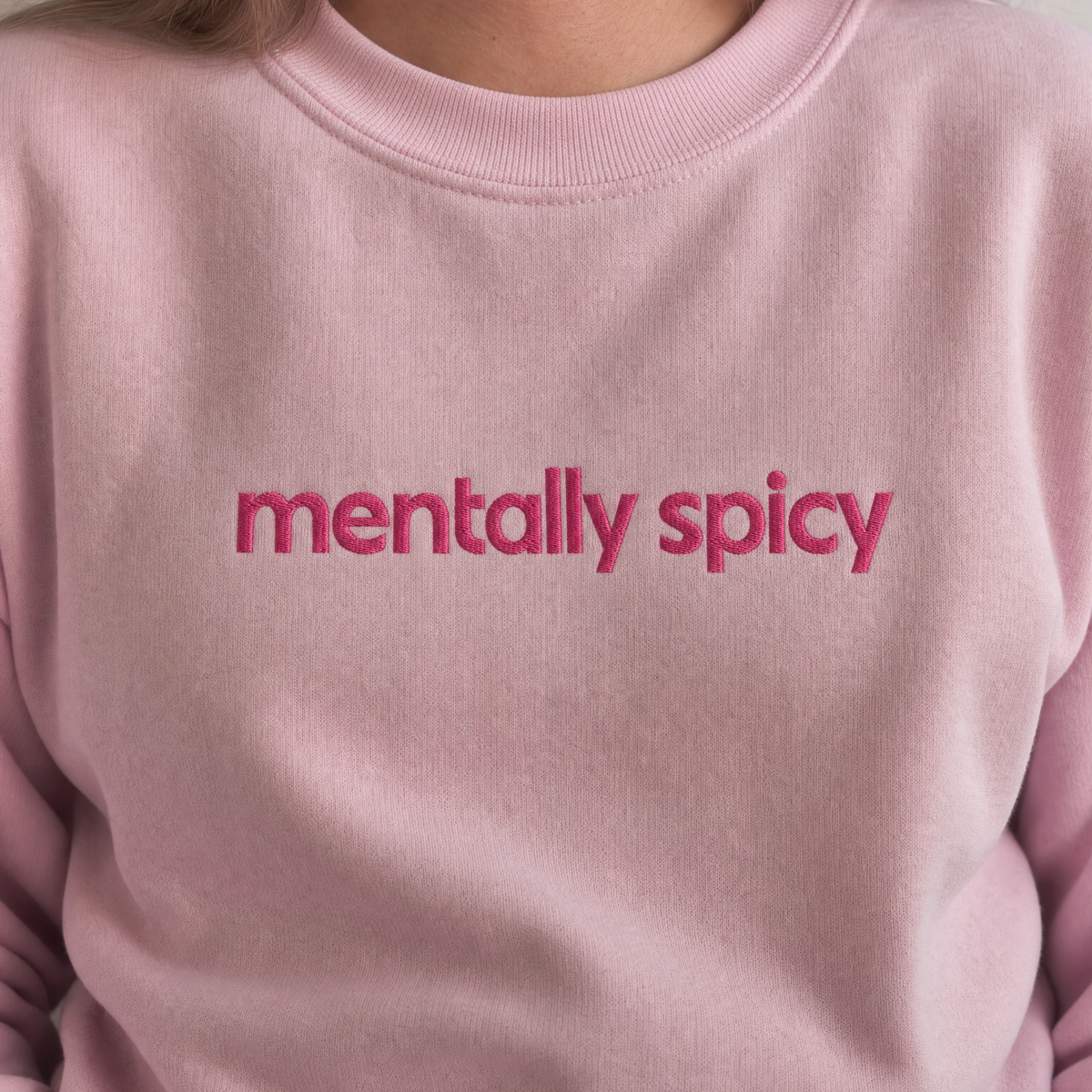 Model wearing the Mentally Spicy sweatshirt in Light Pink, lifestyle image 2