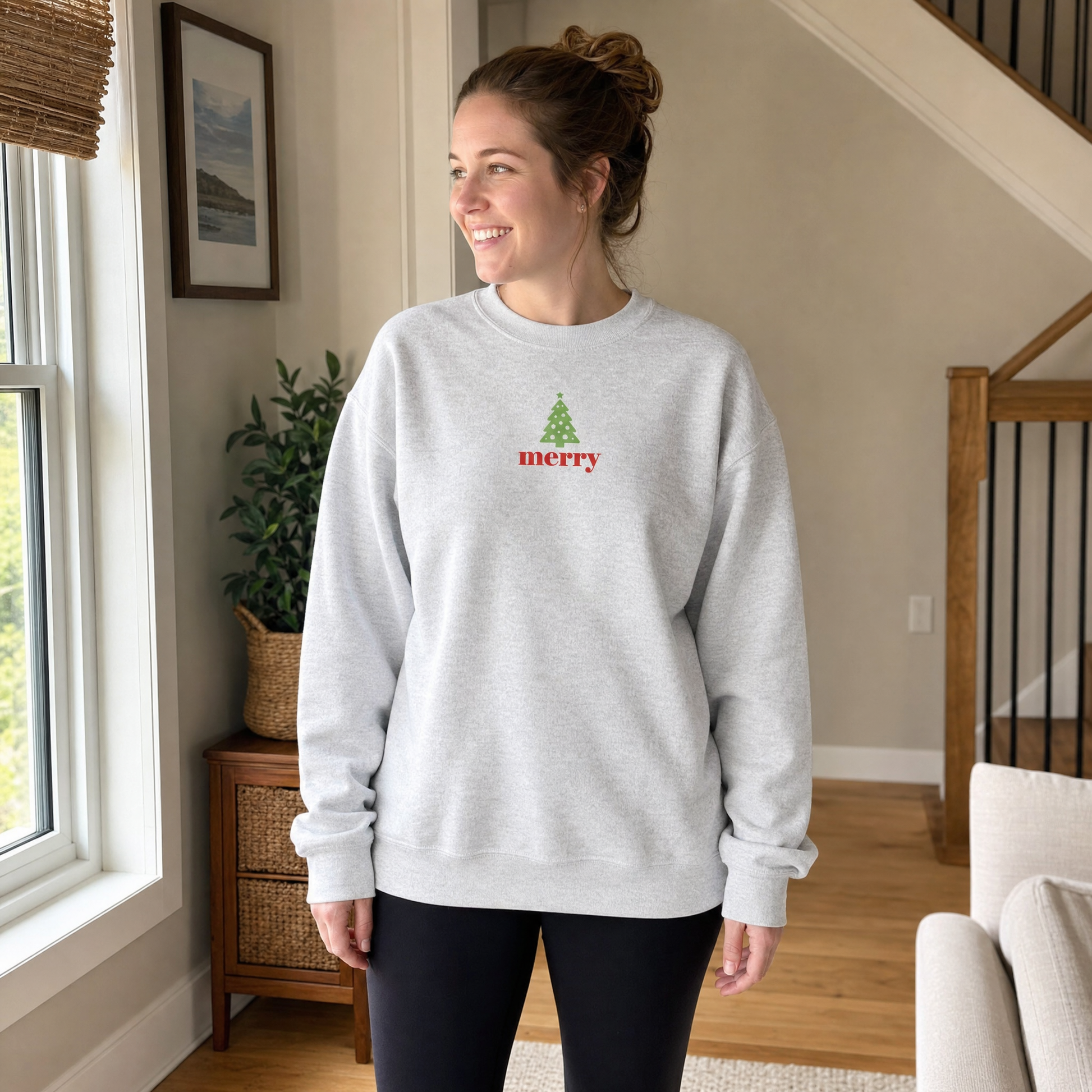 Model wearing the Merry Christmas Tree sweatshirt in Ash, lifestyle image 1