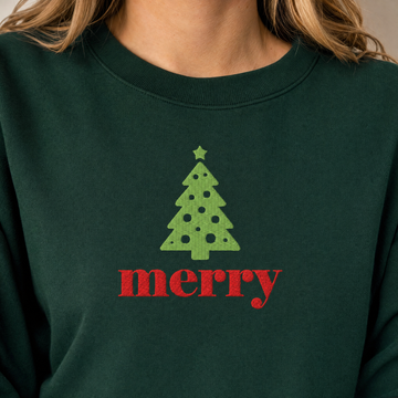 Model wearing the Merry Christmas Tree sweatshirt in Forest Green, lifestyle image 2